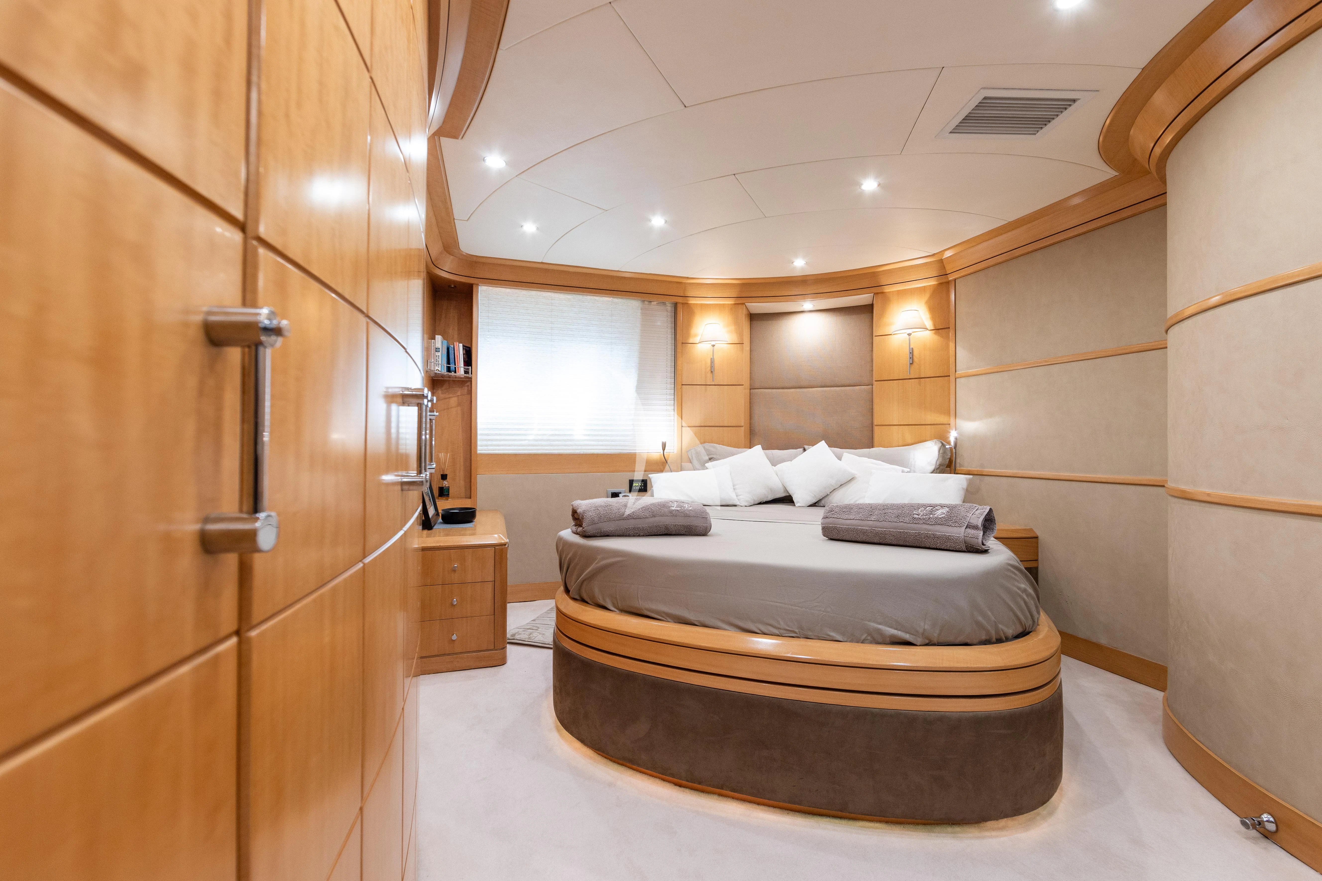 a bed in a room aboard LADY B Yacht for Charter