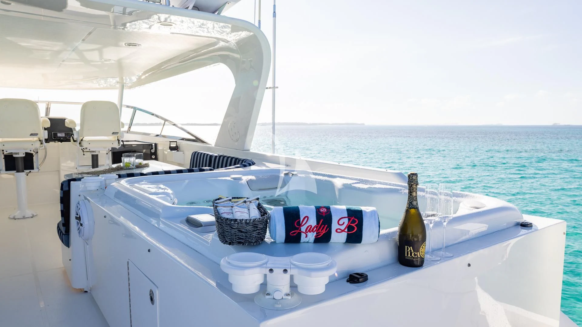 a boat with bottles and cans on it aboard LADY B Yacht for Charter