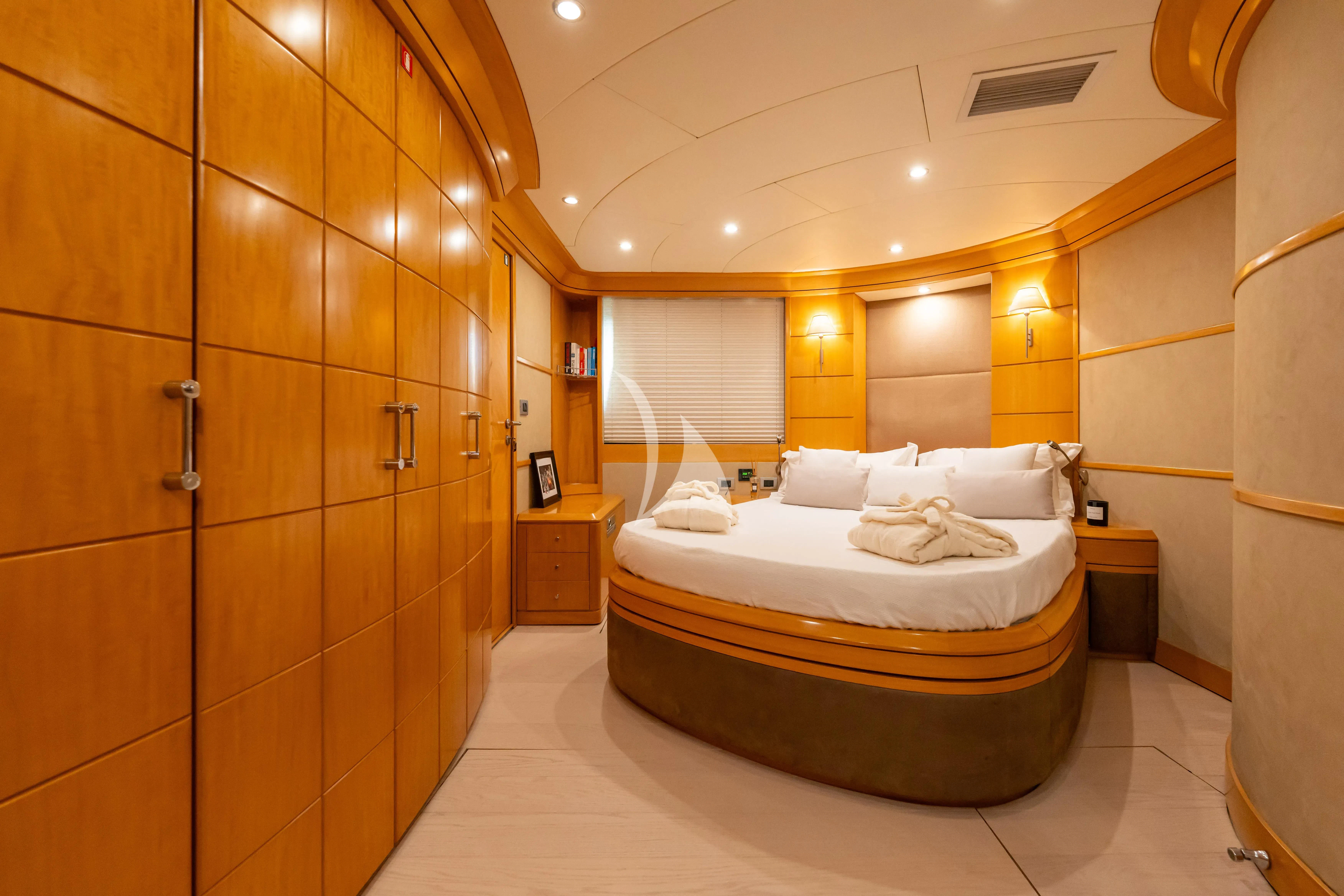 a large bathroom with a large mirror aboard LADY B Yacht for Charter