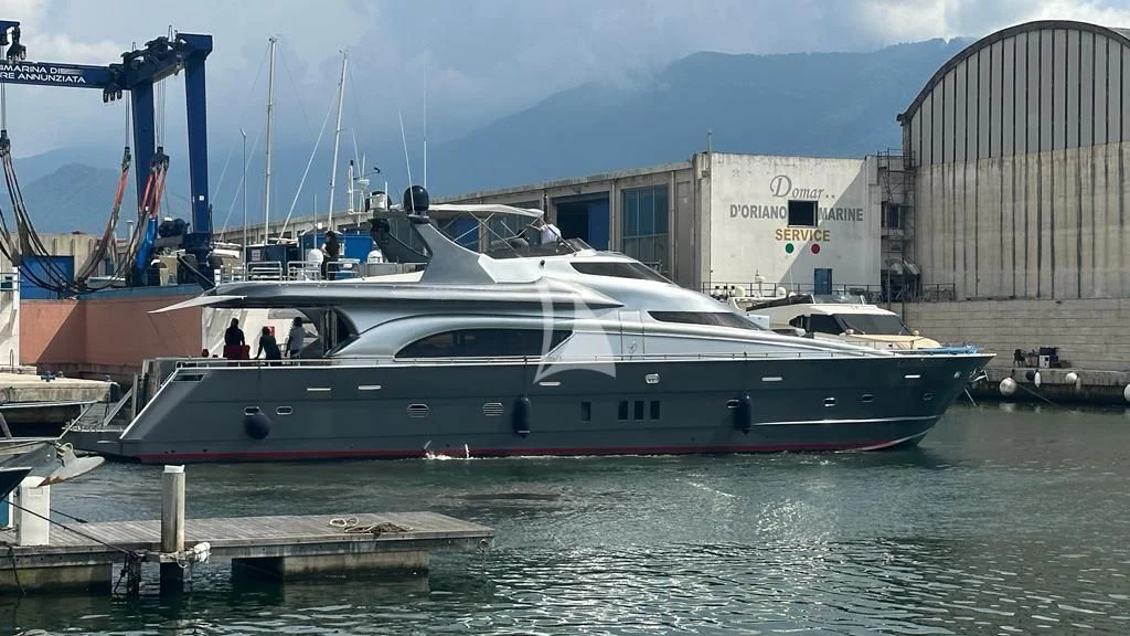 a boat docked at a pier aboard LADY B Yacht for Charter