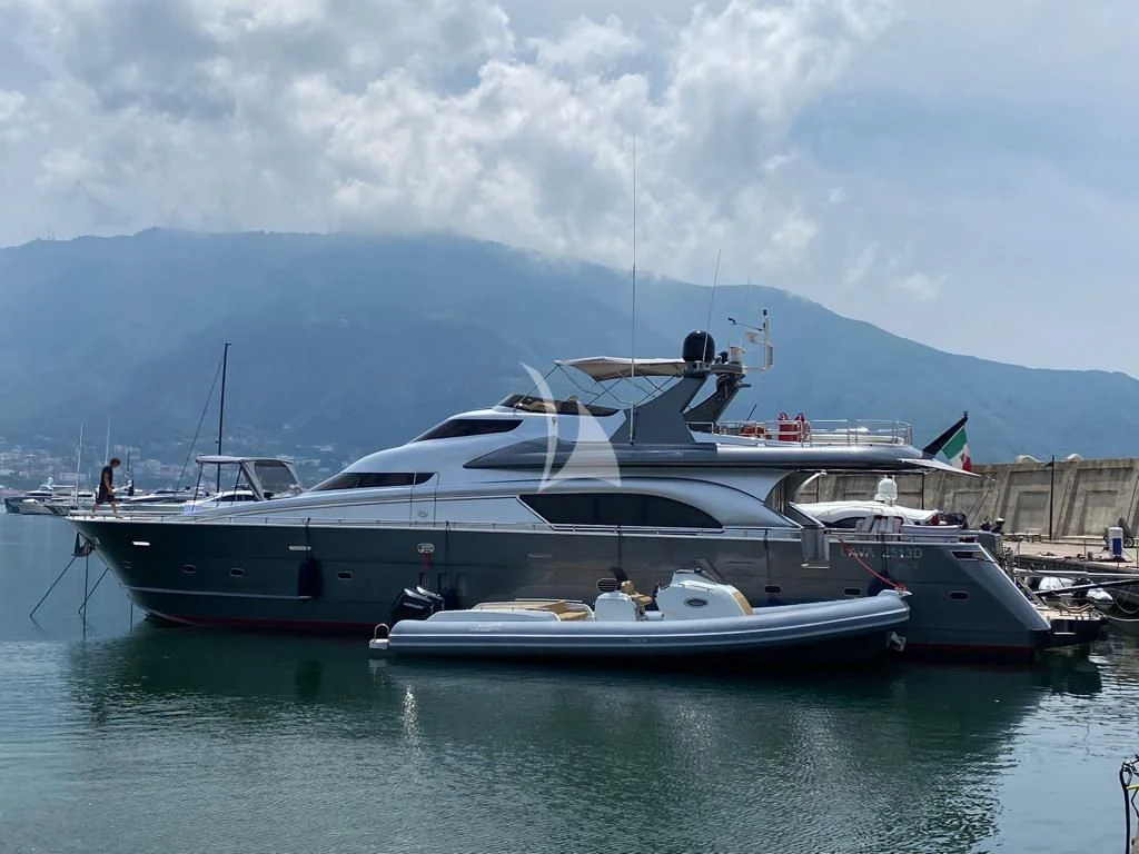 a boat docked at a pier aboard LADY B Yacht for Charter