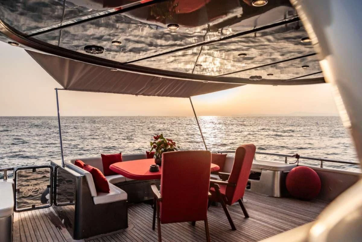 a boat with chairs and tables aboard LADY B Yacht for Charter