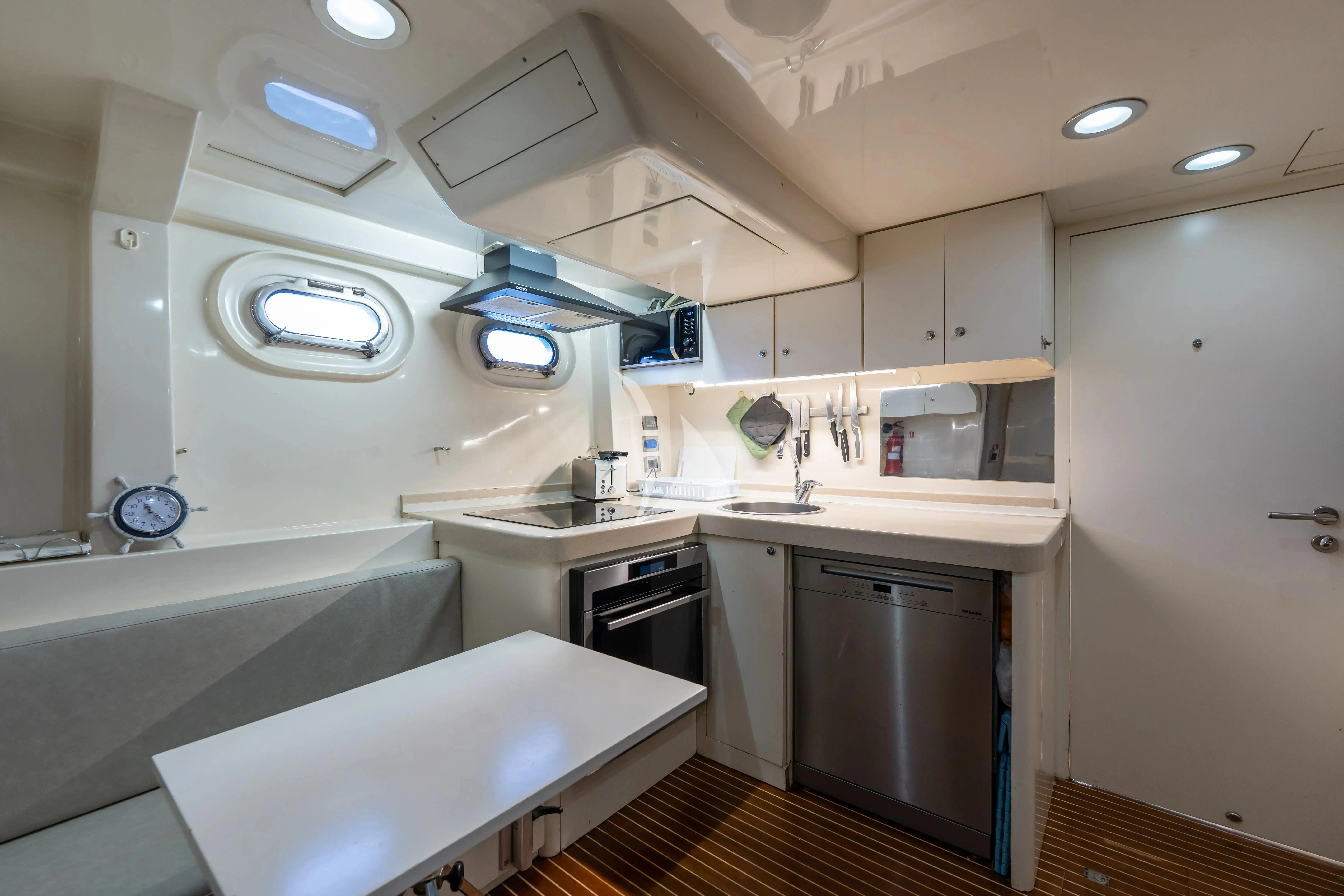 a kitchen with a large island aboard LADY B Yacht for Charter