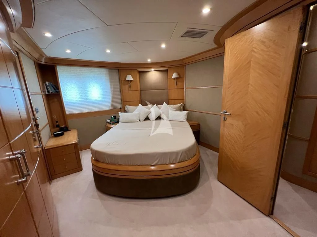 a large hotel room with a bed aboard LADY B Yacht for Charter