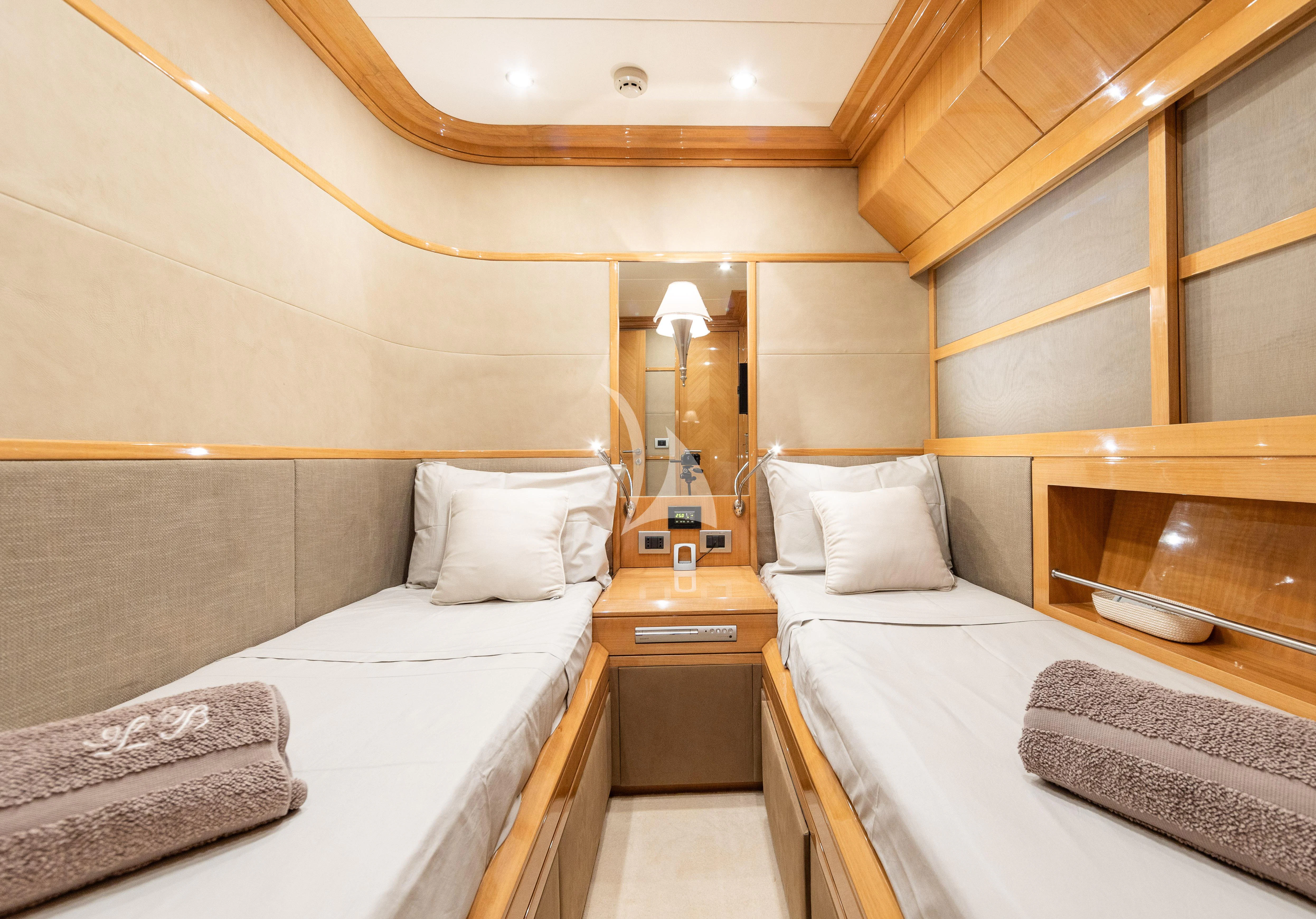 a room with two beds aboard LADY B Yacht for Charter