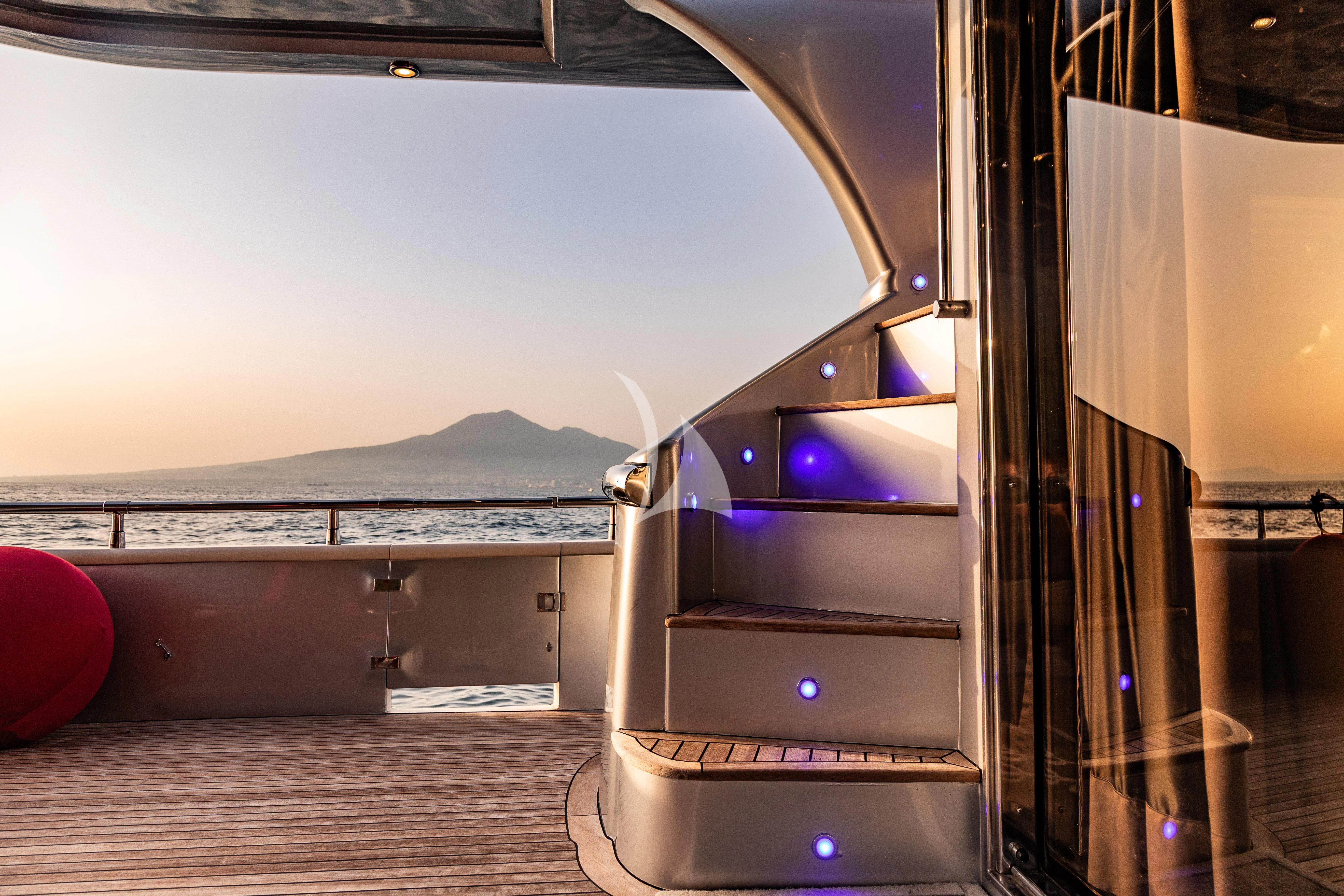 a computer tower with a purple light aboard LADY B Yacht for Charter