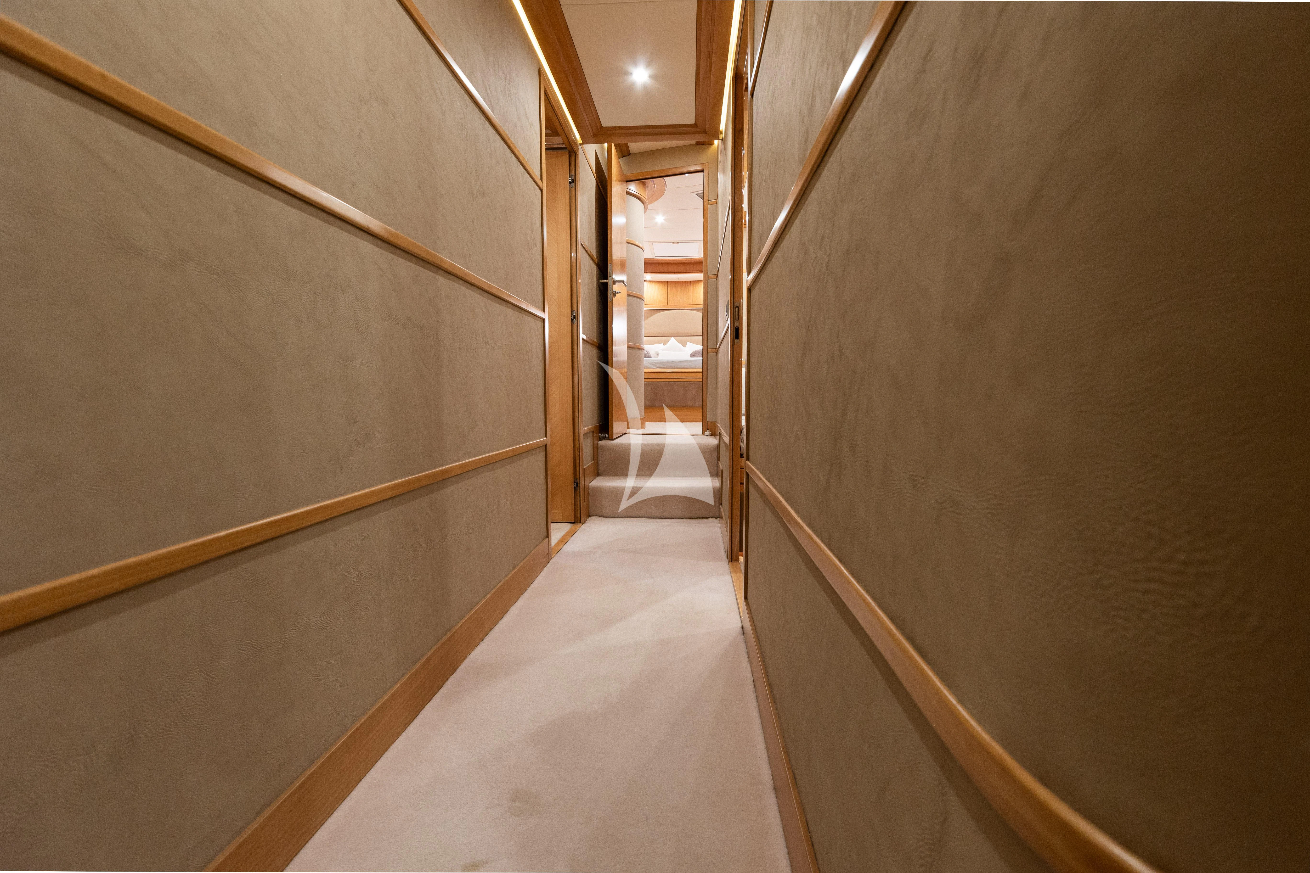 a hallway with a few doors aboard LADY B Yacht for Charter