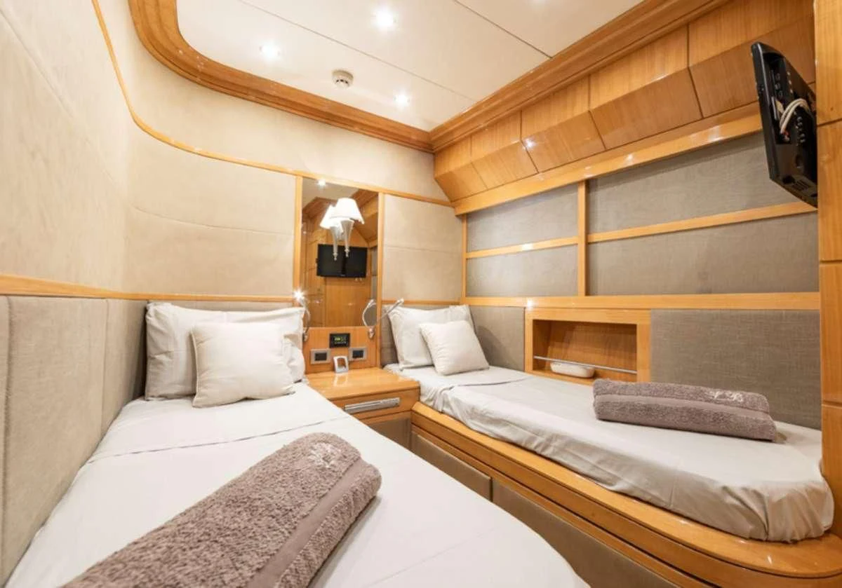 a room with two beds aboard LADY B Yacht for Charter