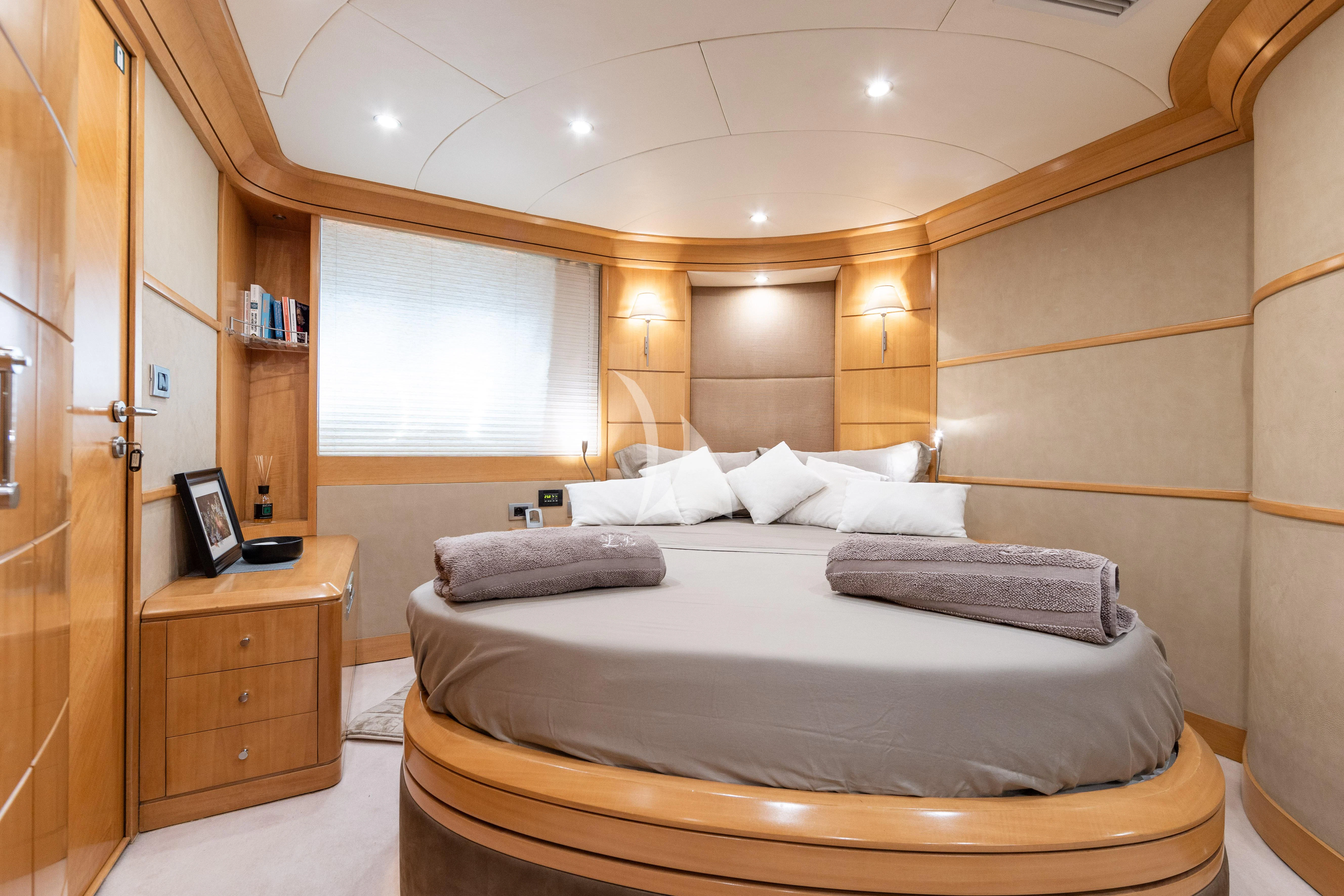 a bed in a room aboard LADY B Yacht for Charter