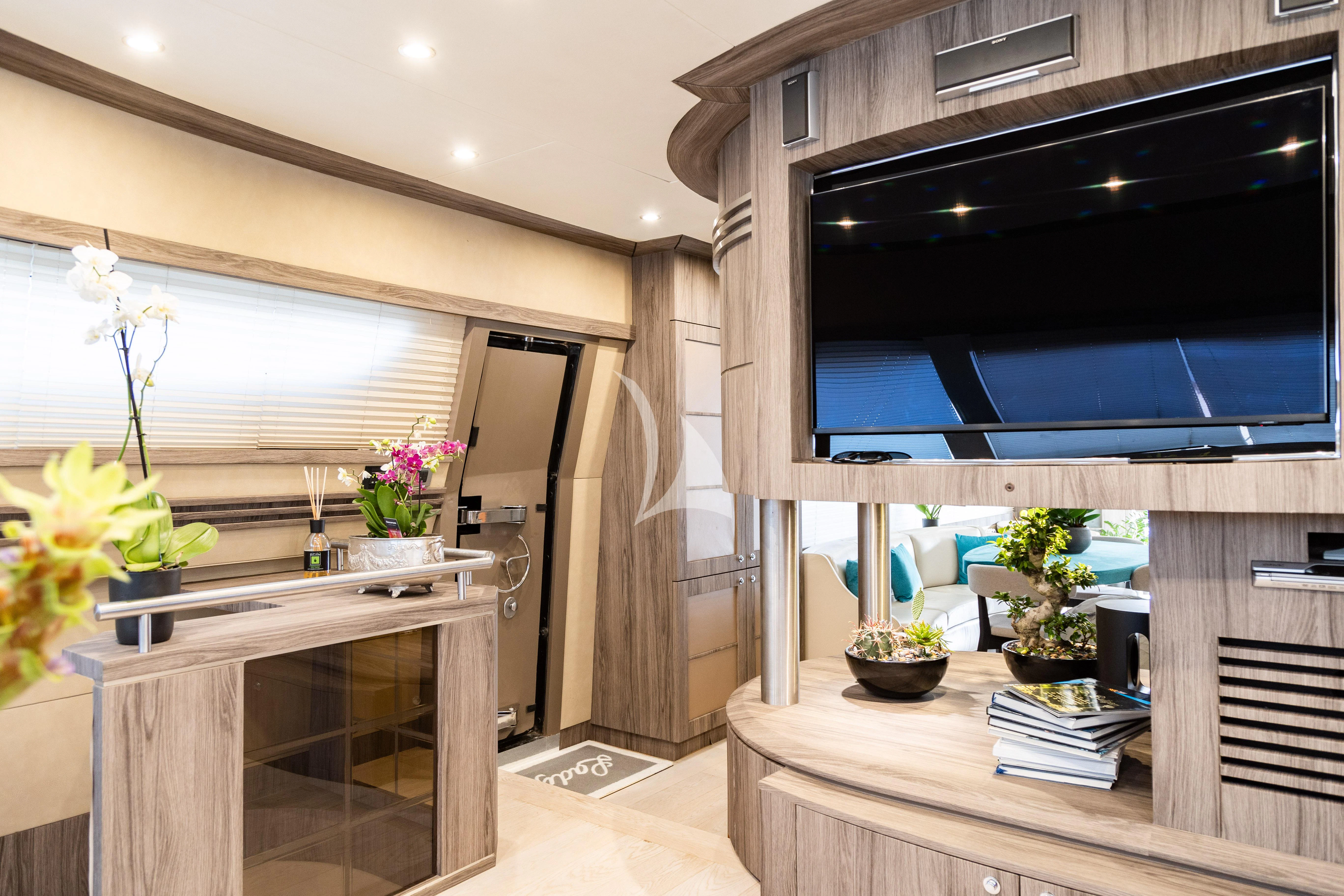 a kitchen with a table and a large oven aboard LADY B Yacht for Charter