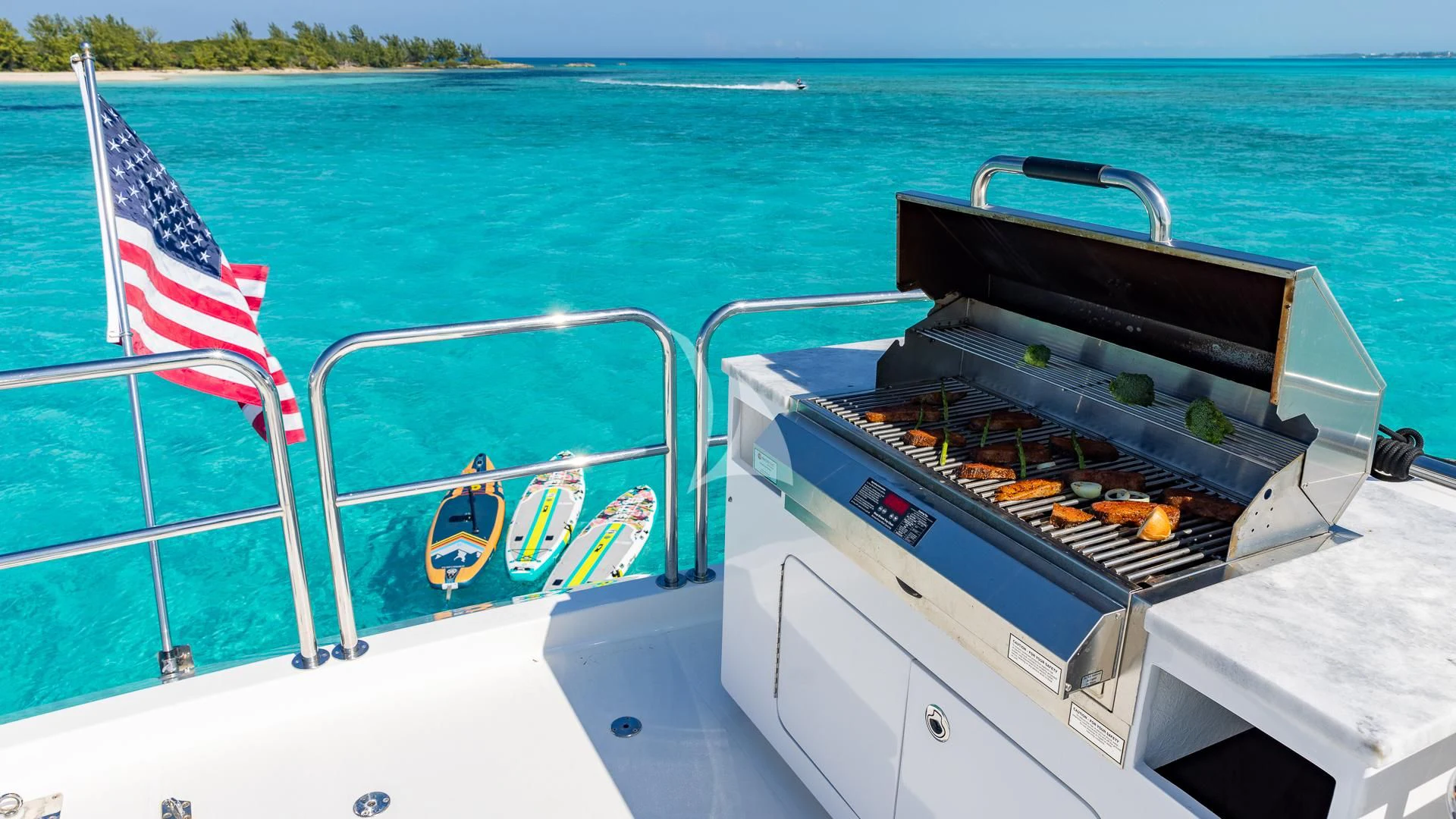 a boat with a tray of food on it aboard LADY B Yacht for Charter