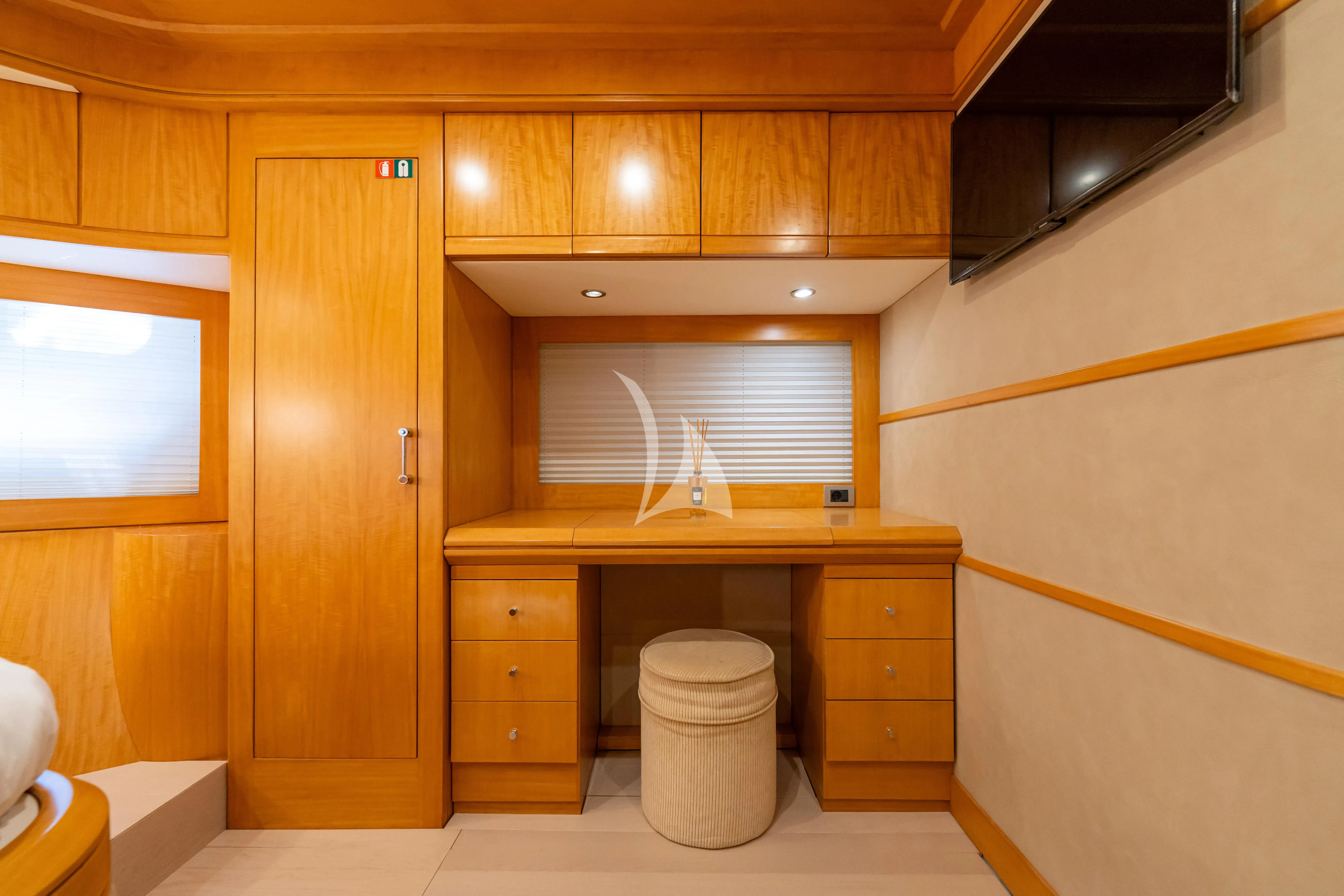 a bathroom with wooden cabinets aboard LADY B Yacht for Charter