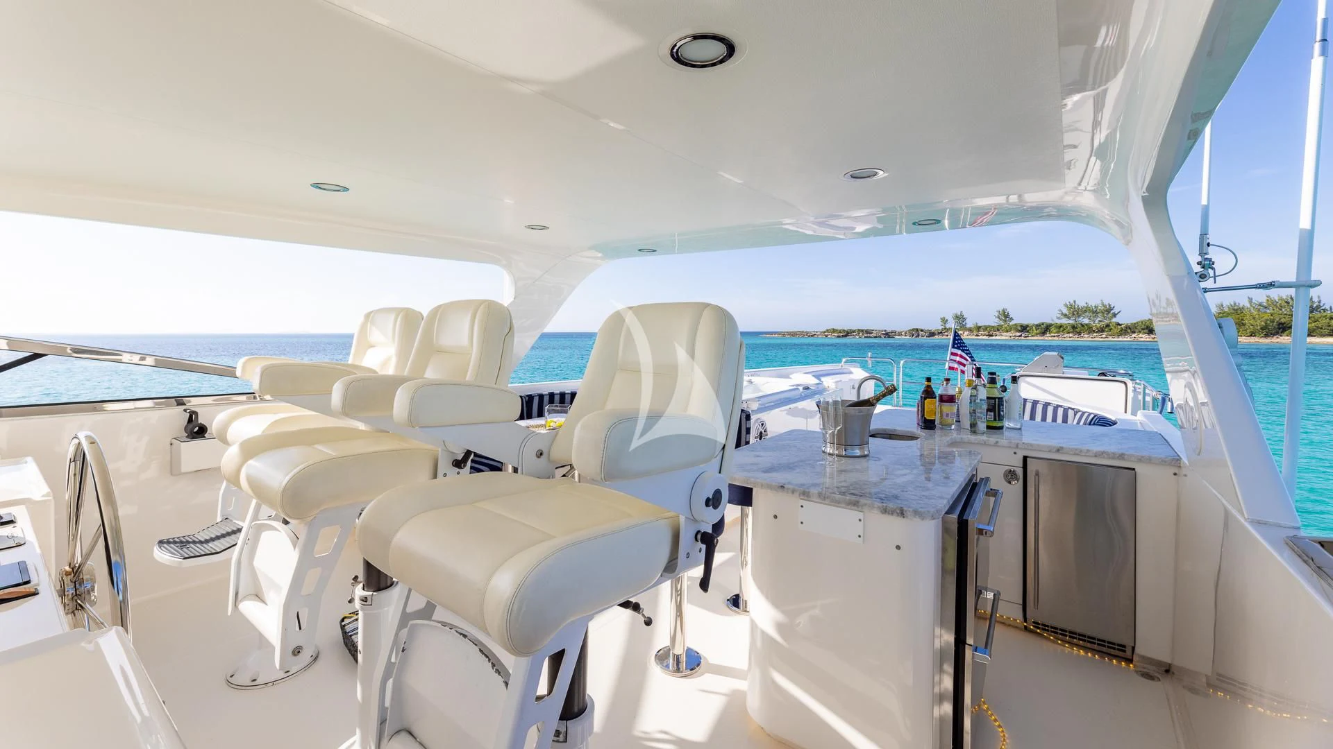 a boat with a table and chairs aboard LADY B Yacht for Charter