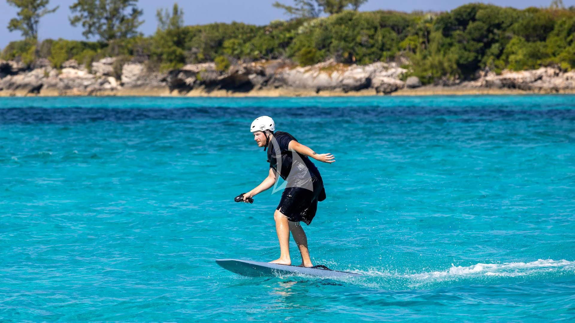 a person surfing on the sea aboard LADY B Yacht for Charter