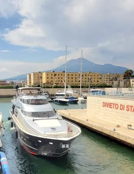 a boat docked at a pier aboard LADY B Yacht for Charter