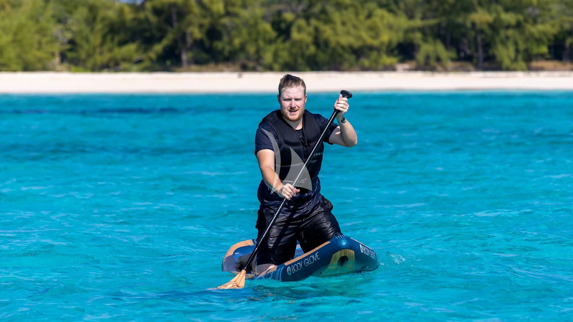 a man on a jet ski aboard LADY B Yacht for Charter