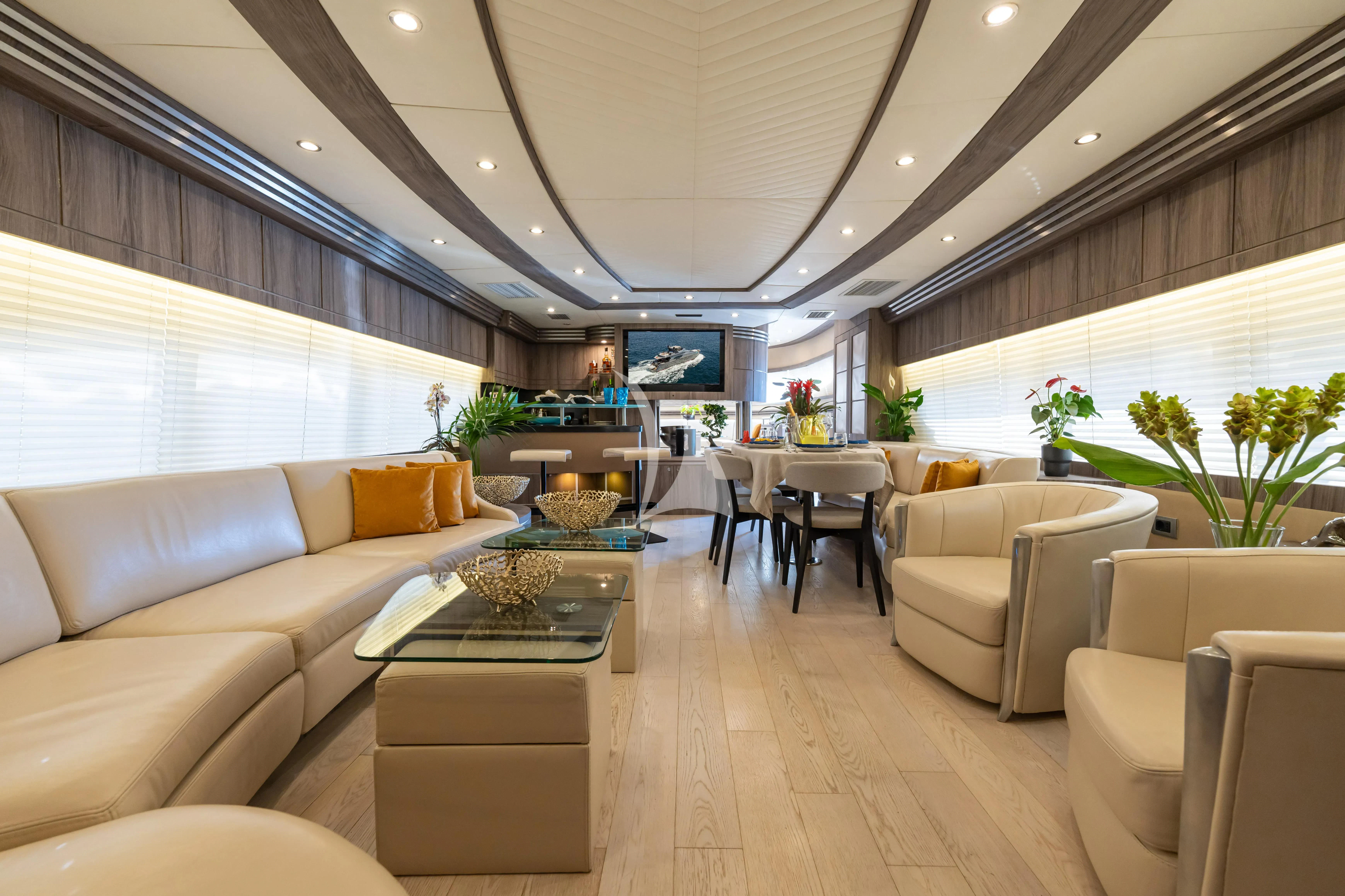 a living room with a large window aboard LADY B Yacht for Charter