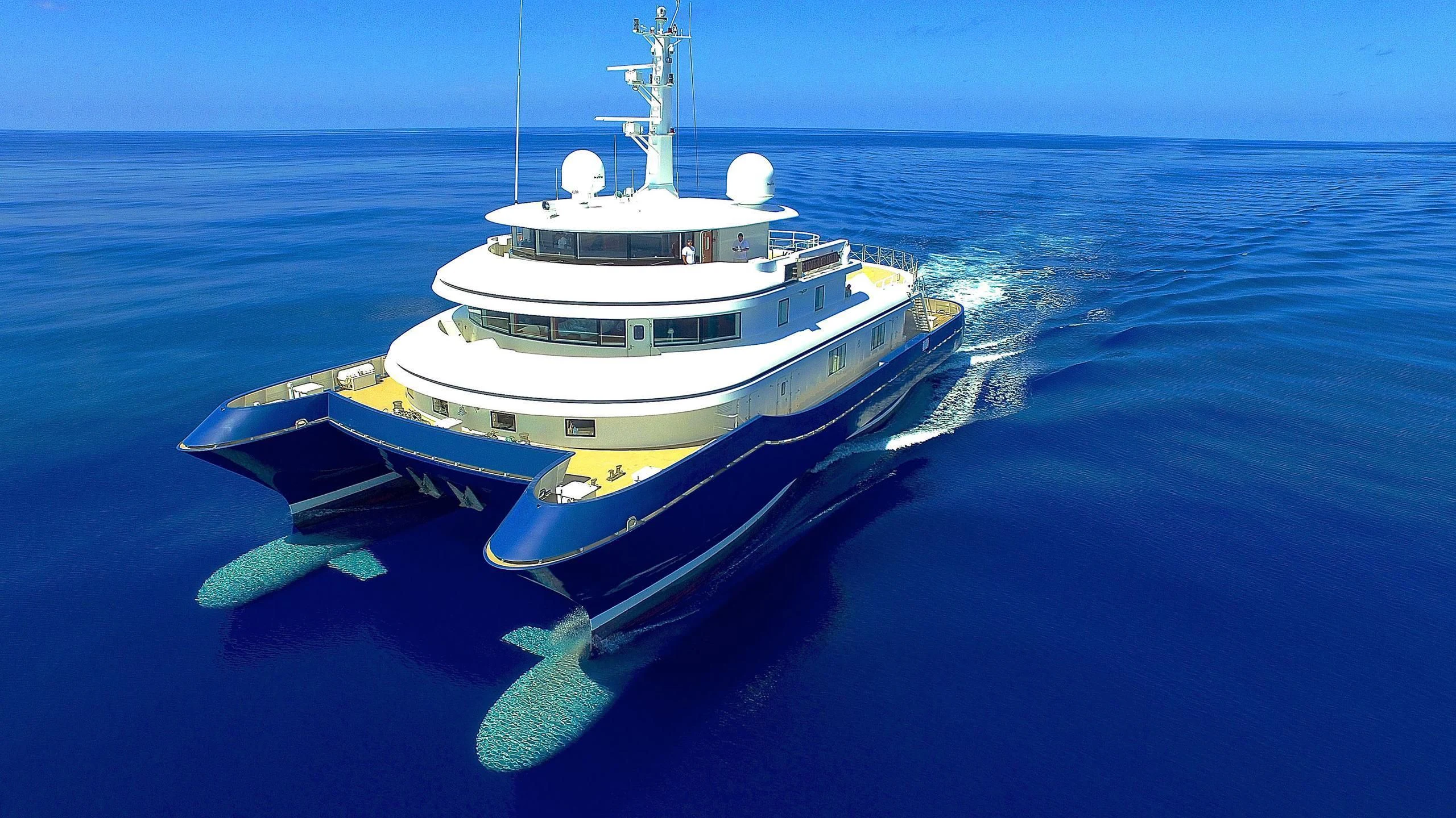 a white boat in the water aboard NURJA Yacht for Sale