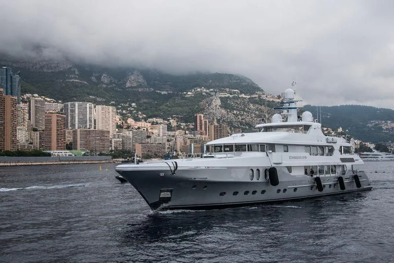 a white yacht on the water aboard CHASSEUR Yacht for Charter