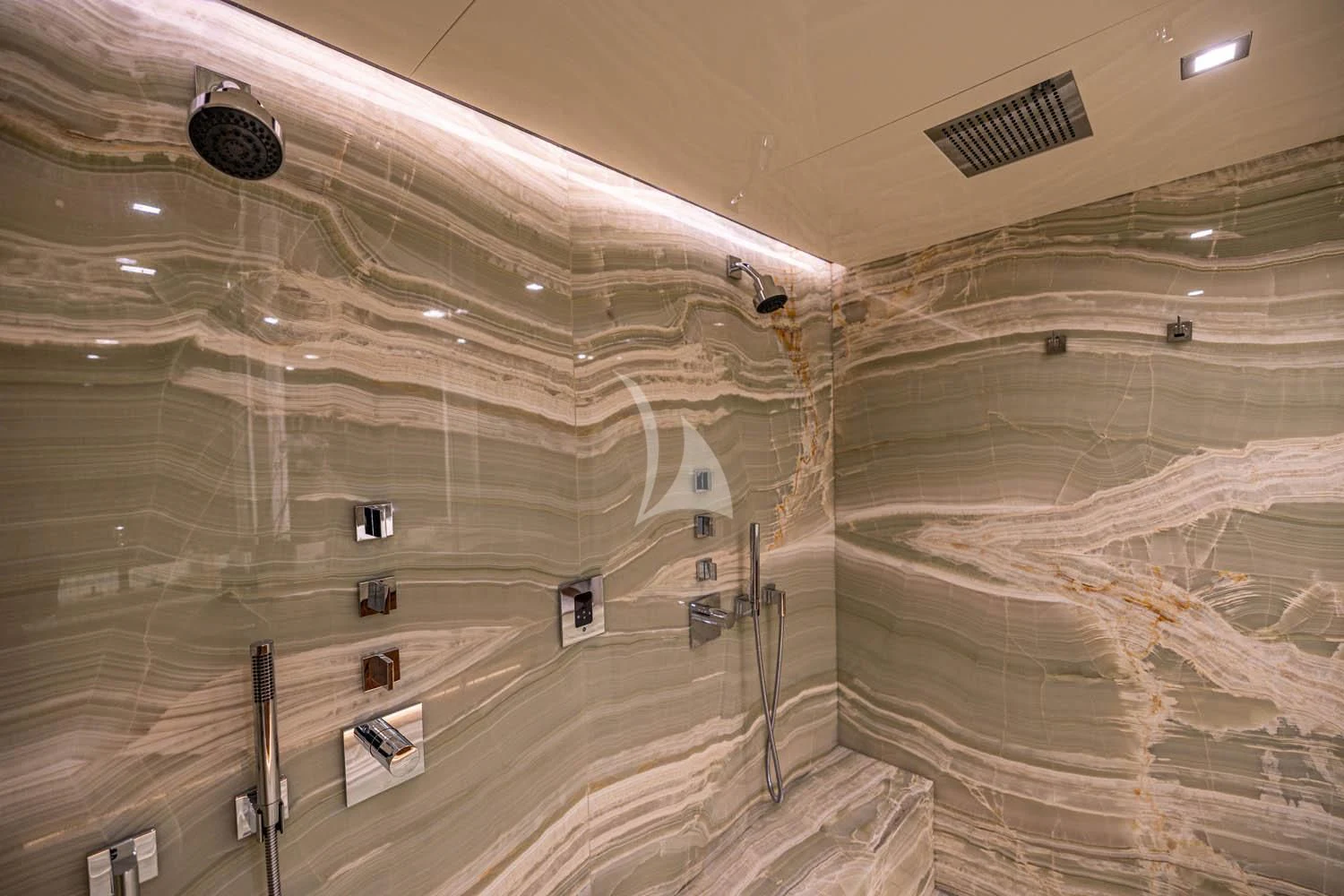 a large room with a large wall aboard CHASSEUR Yacht for Charter