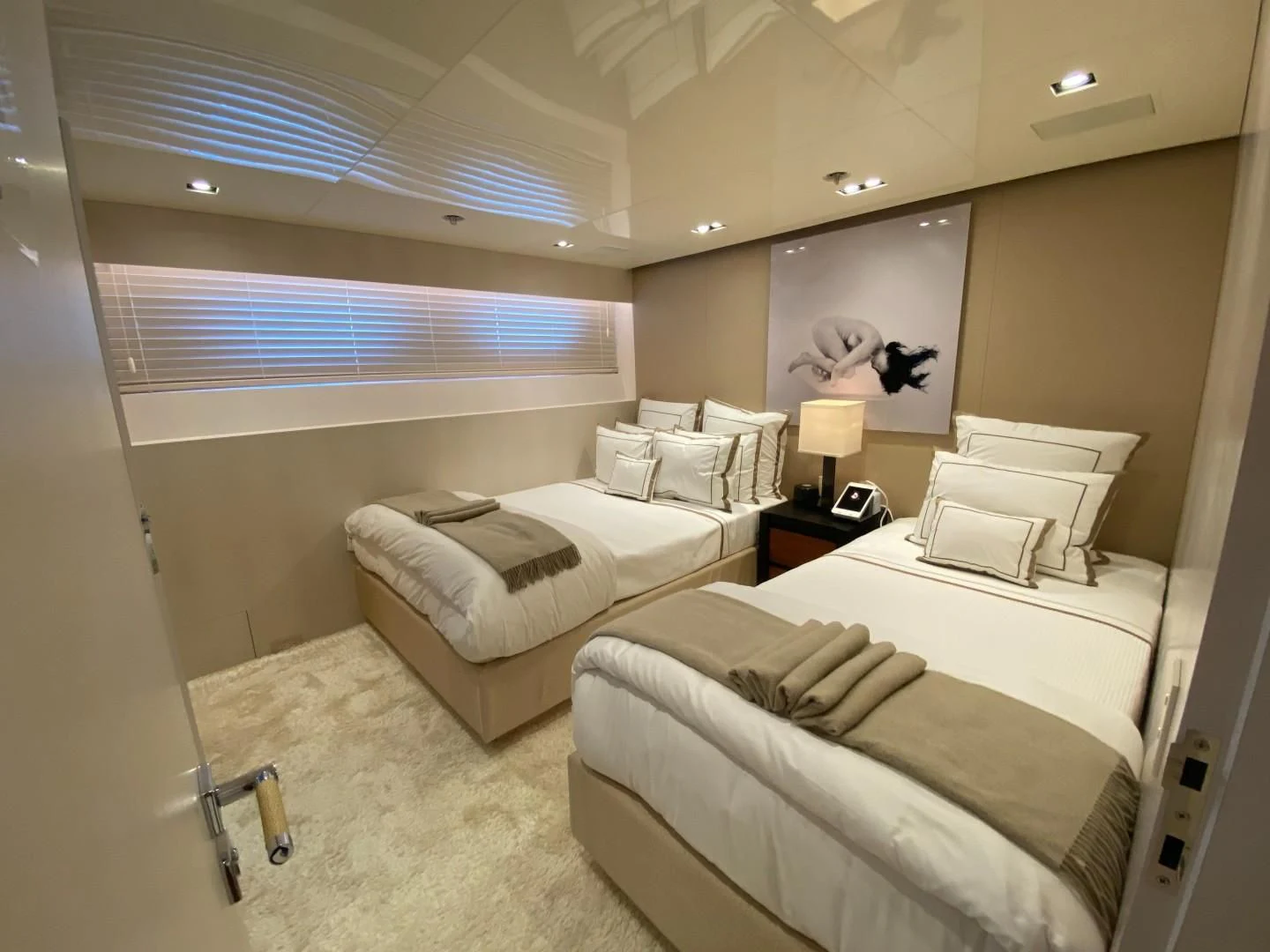 a room with two beds aboard CHASSEUR Yacht for Charter