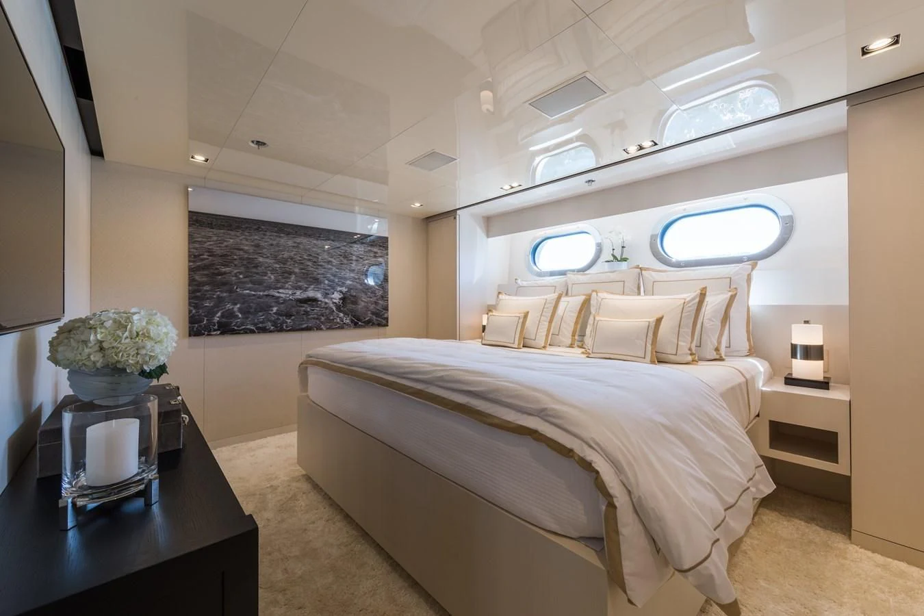 a bed in a room aboard CHASSEUR Yacht for Charter