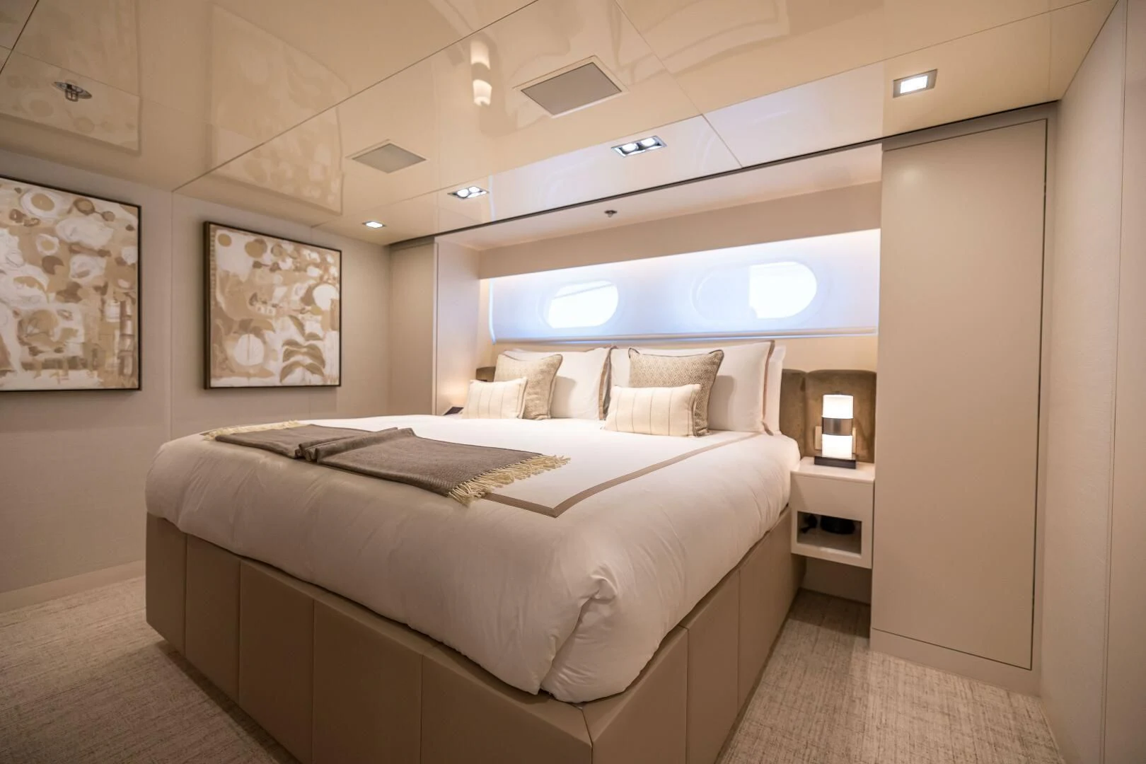 a bedroom with a bed aboard CHASSEUR Yacht for Charter