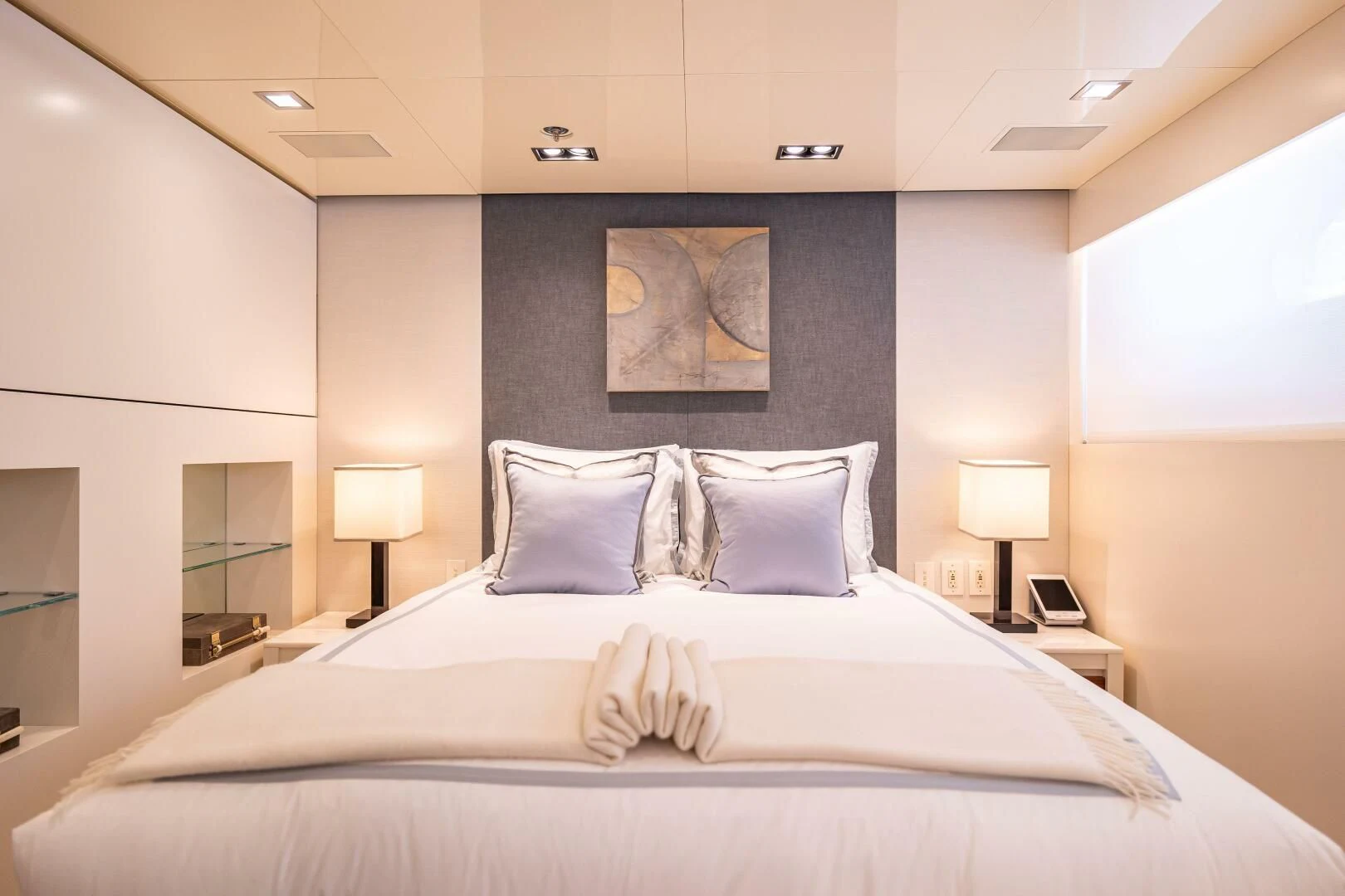 a large bed with pillows aboard CHASSEUR Yacht for Charter