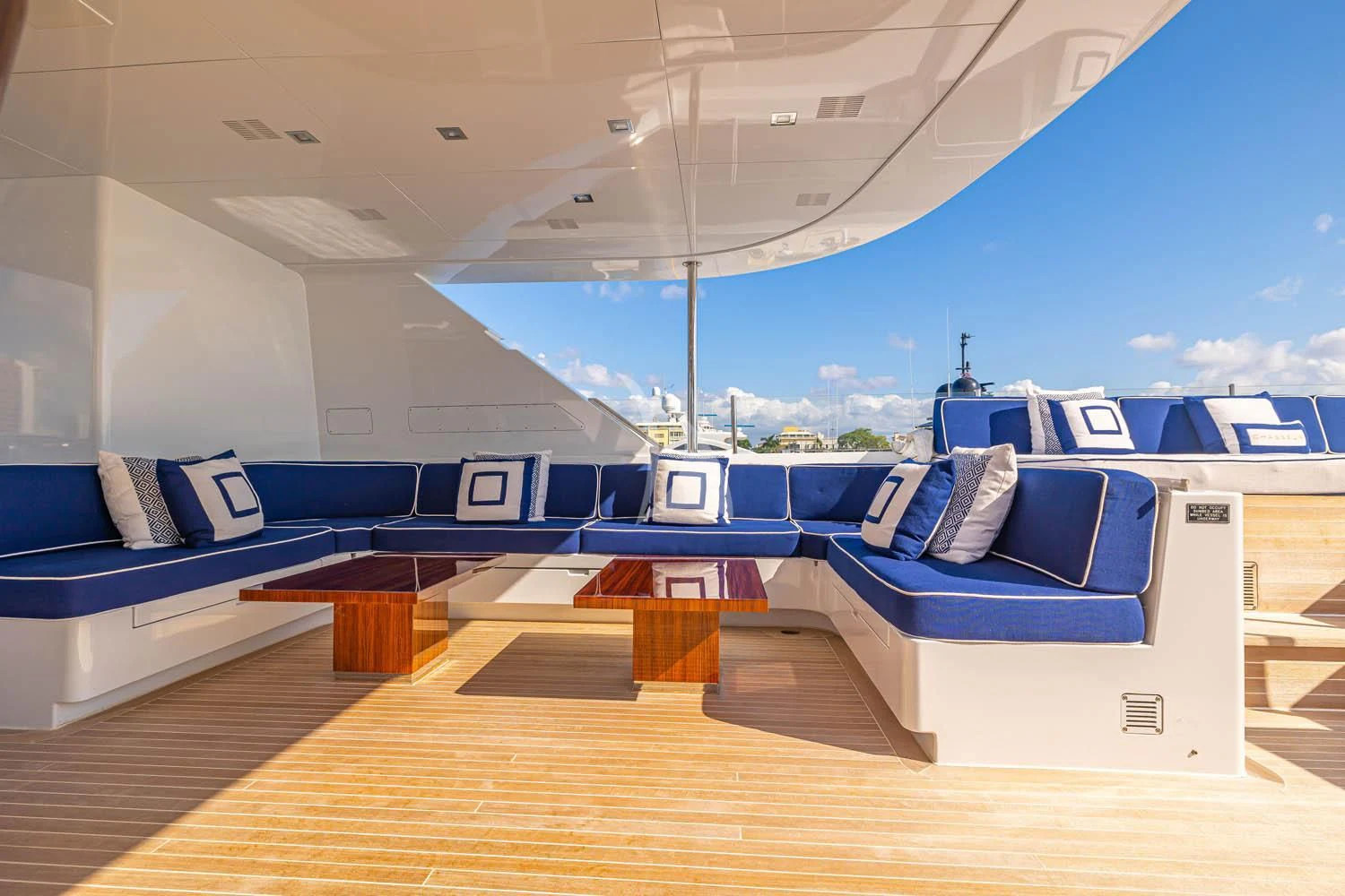 a large blue lounge chair on a deck aboard CHASSEUR Yacht for Charter