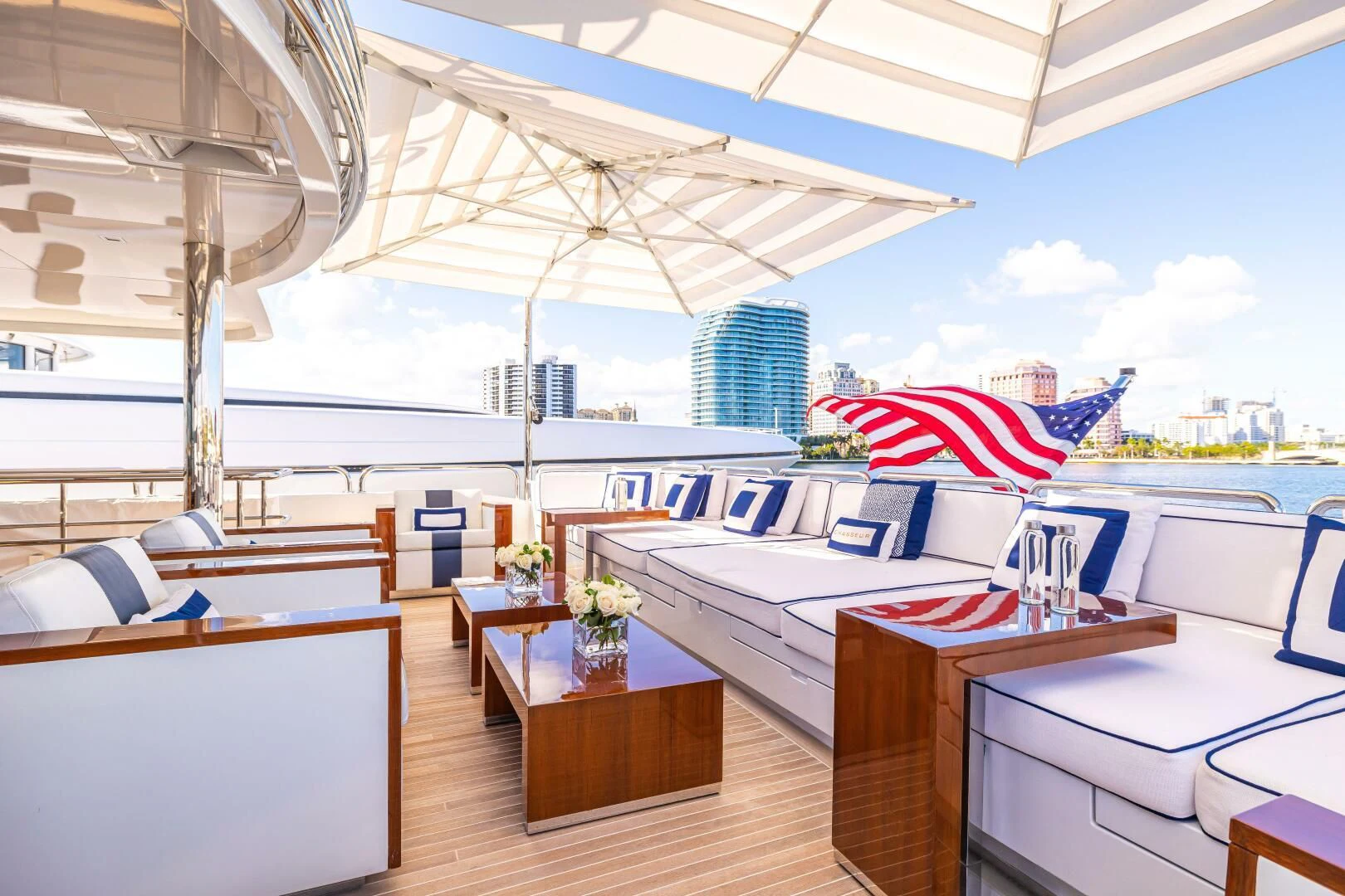 a room with a table and chairs aboard CHASSEUR Yacht for Charter