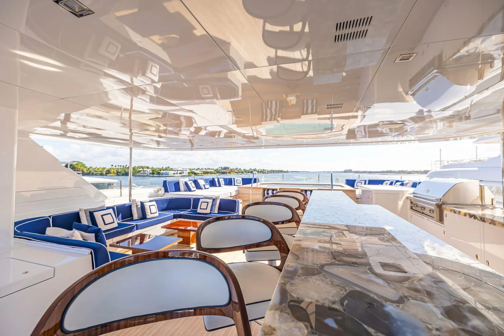 a room with a view of the water and the deck aboard CHASSEUR Yacht for Charter