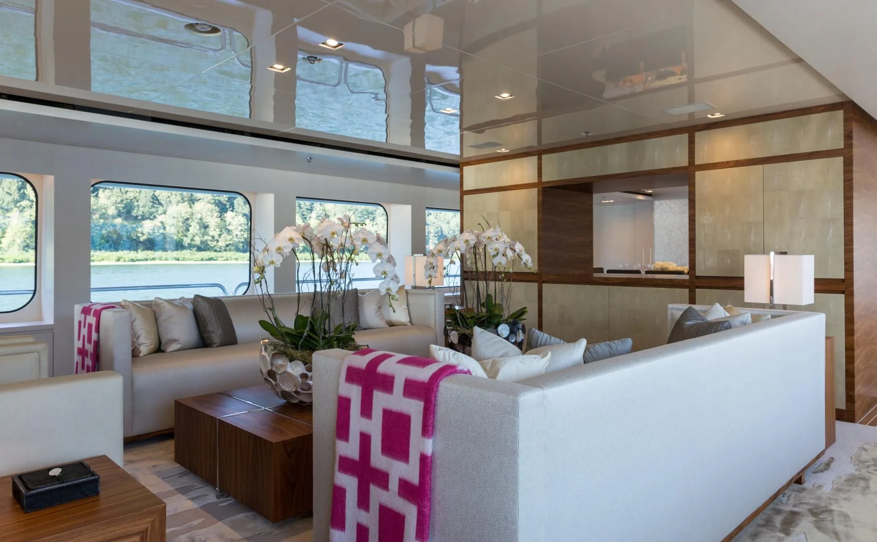 a room with a couch and a table aboard CHASSEUR Yacht for Charter