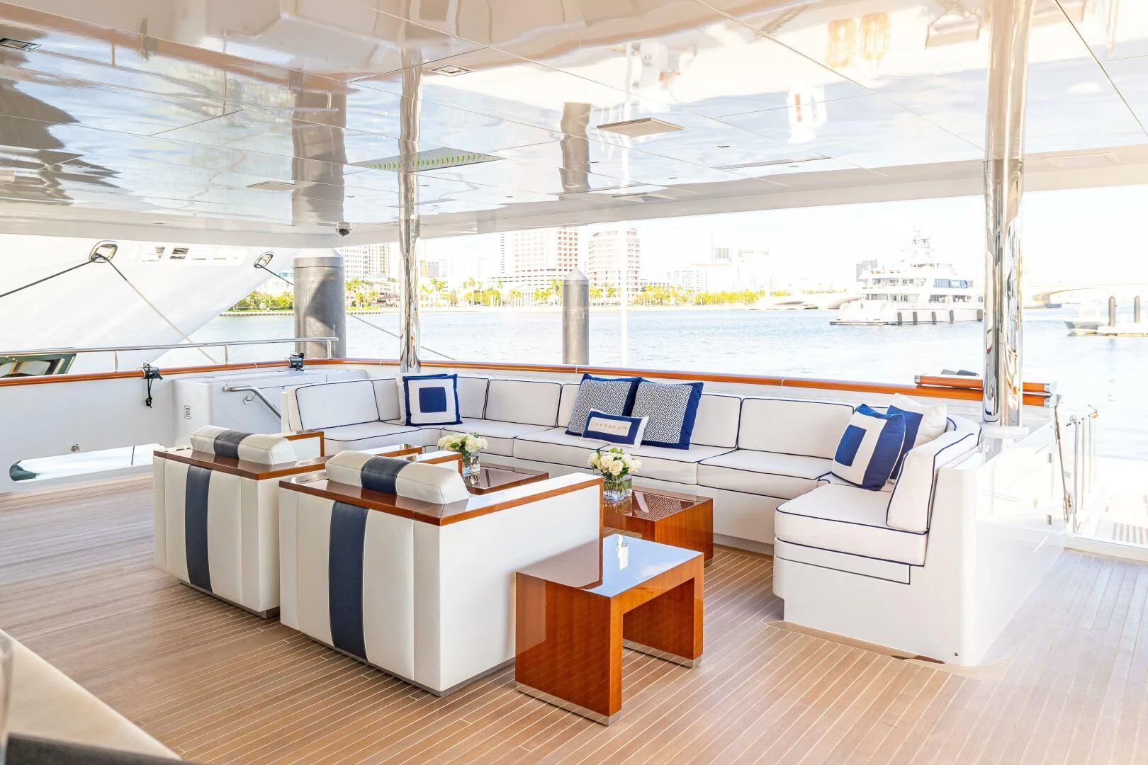 a room with a couch and a table aboard CHASSEUR Yacht for Charter