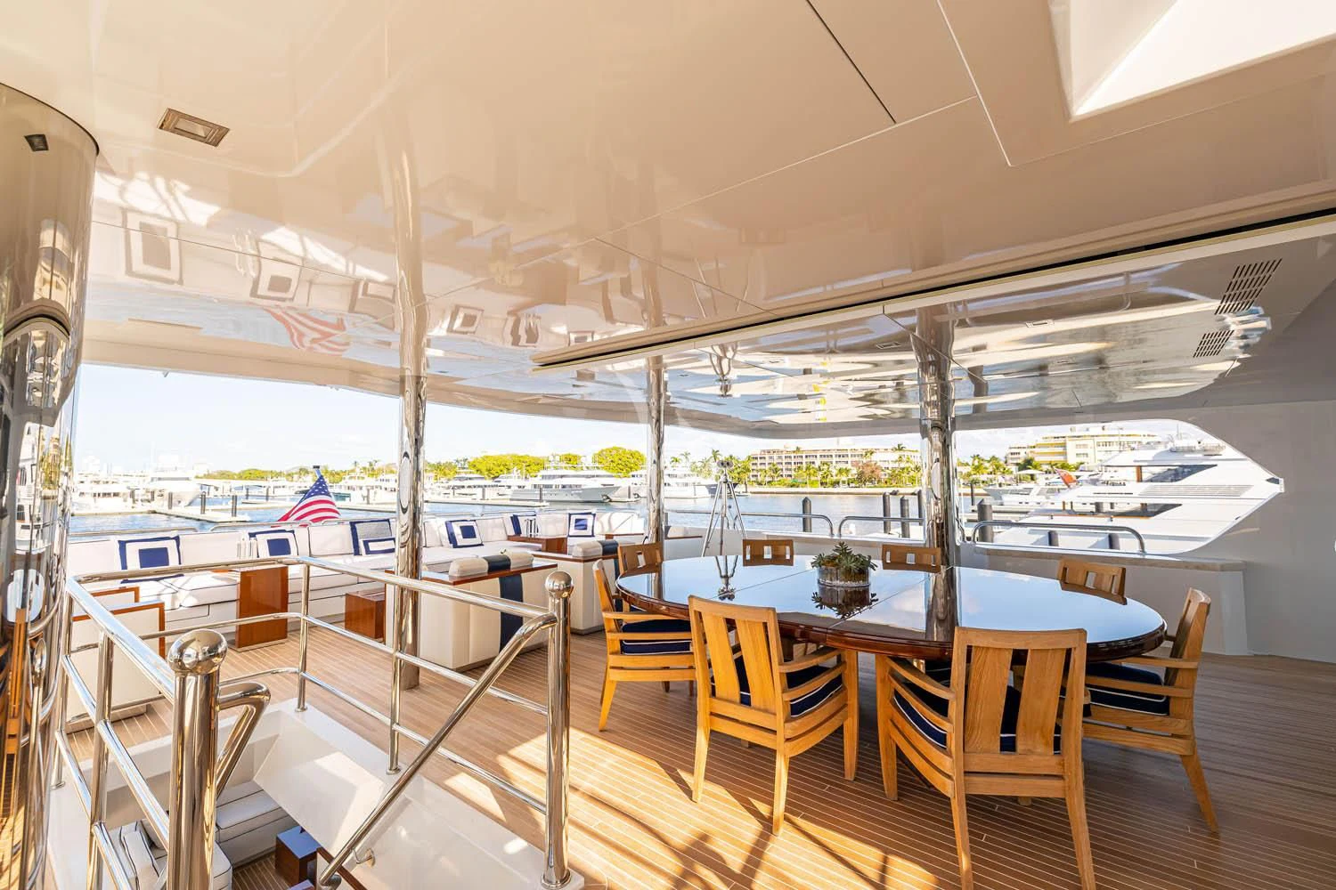 a room with a table and chairs aboard CHASSEUR Yacht for Charter