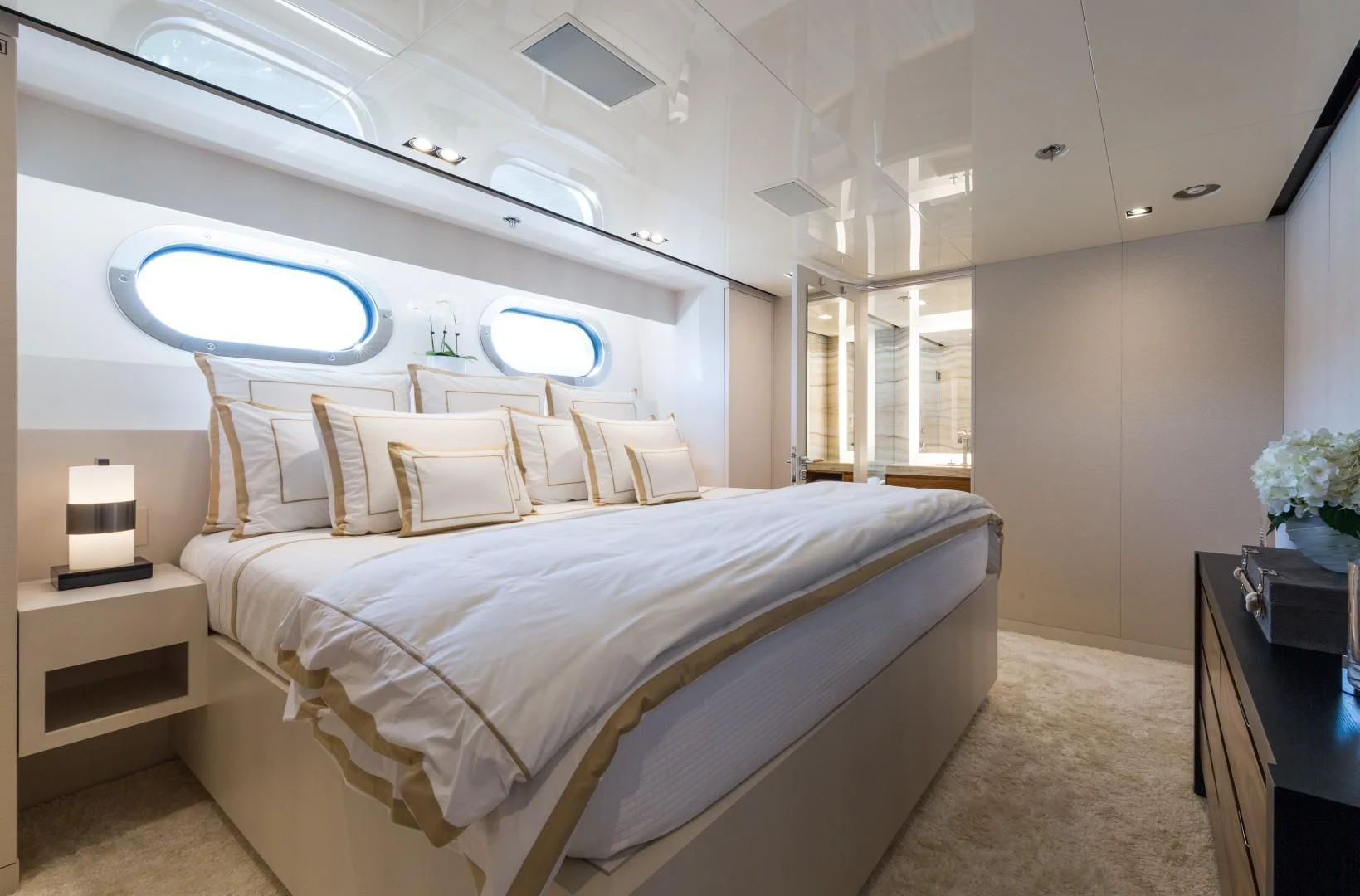 a bed in a room aboard CHASSEUR Yacht for Charter