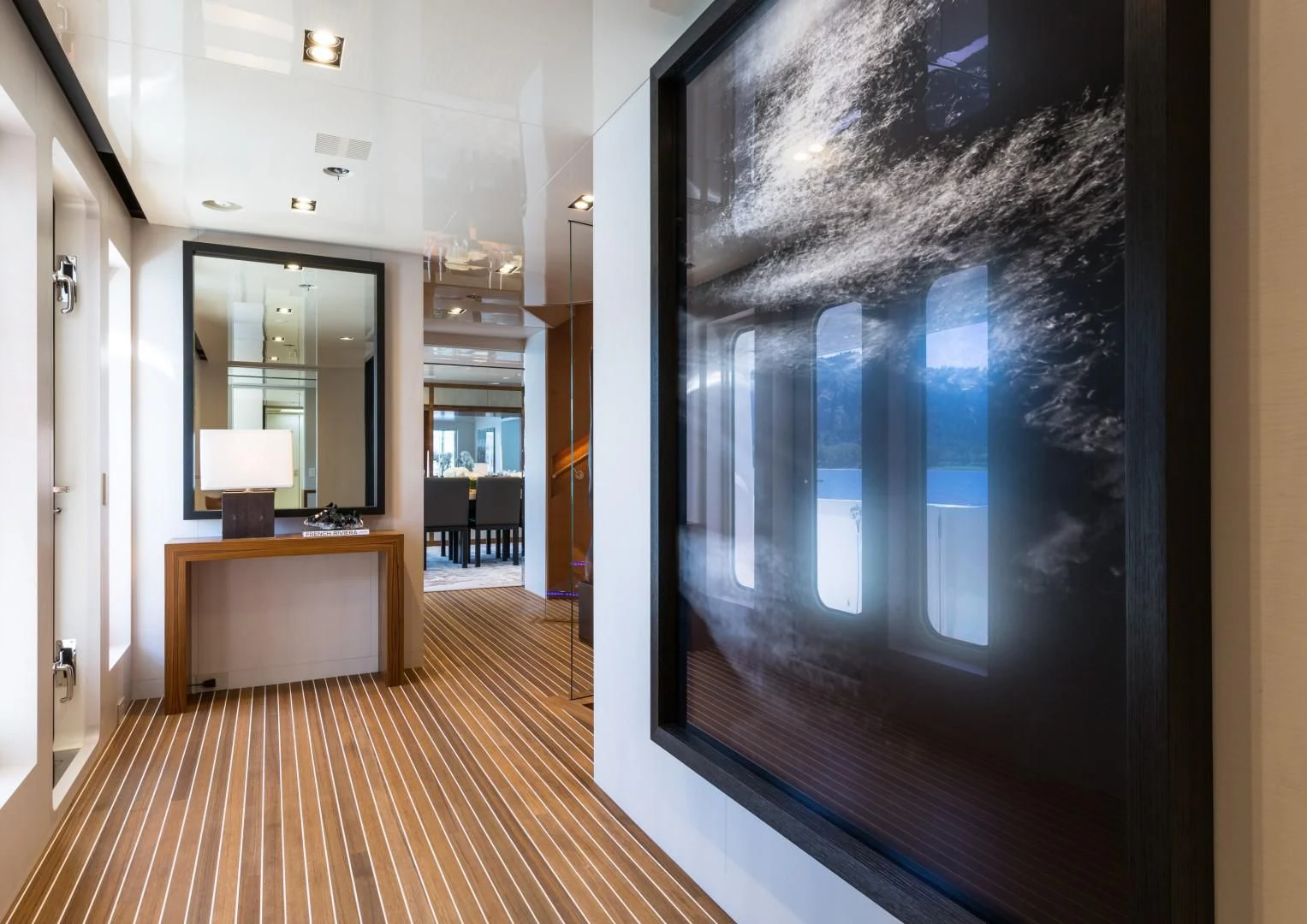 a hallway with a large window aboard CHASSEUR Yacht for Charter