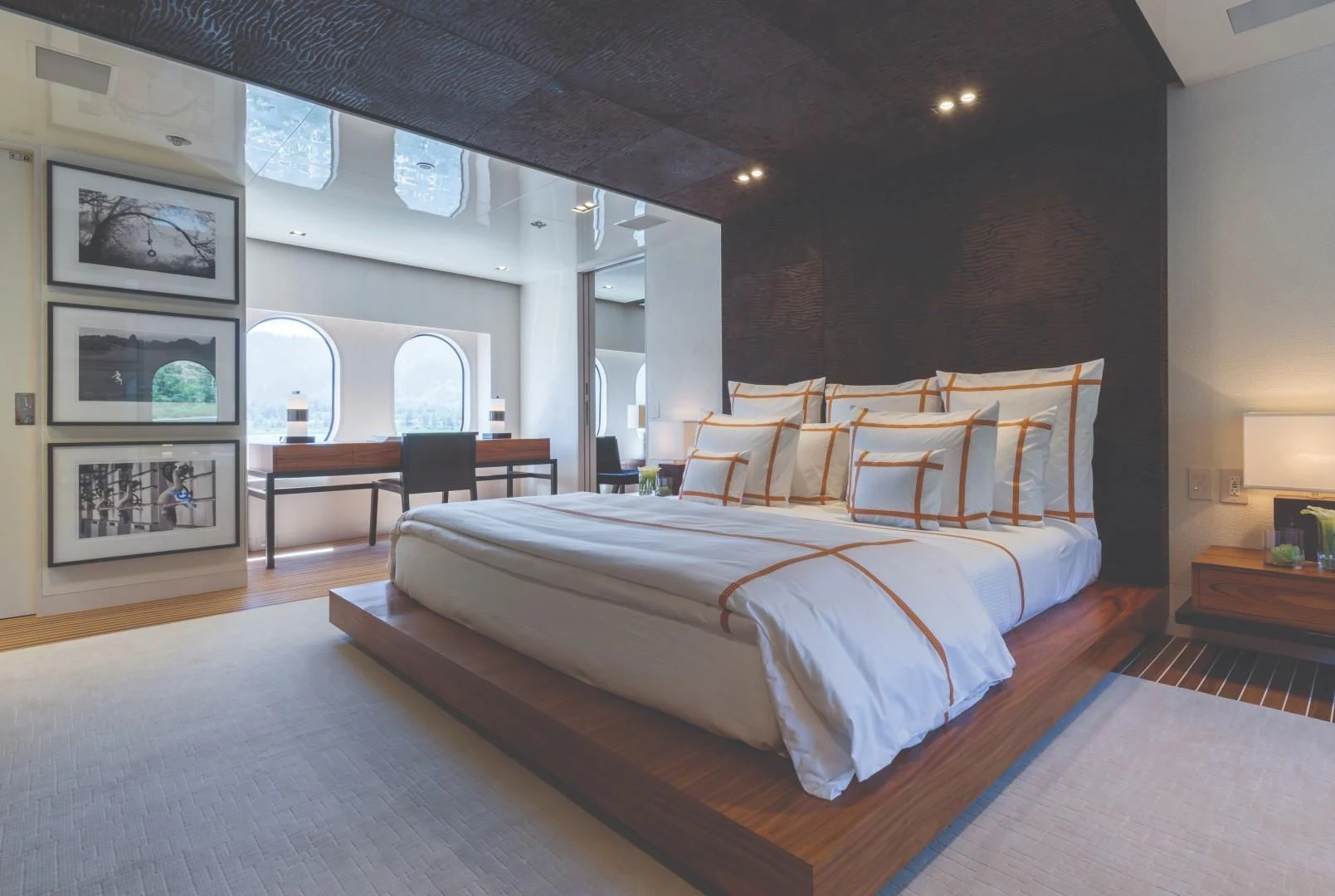 a large bed in a room aboard CHASSEUR Yacht for Charter
