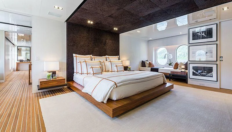 a large bedroom with a large bed aboard CHASSEUR Yacht for Charter