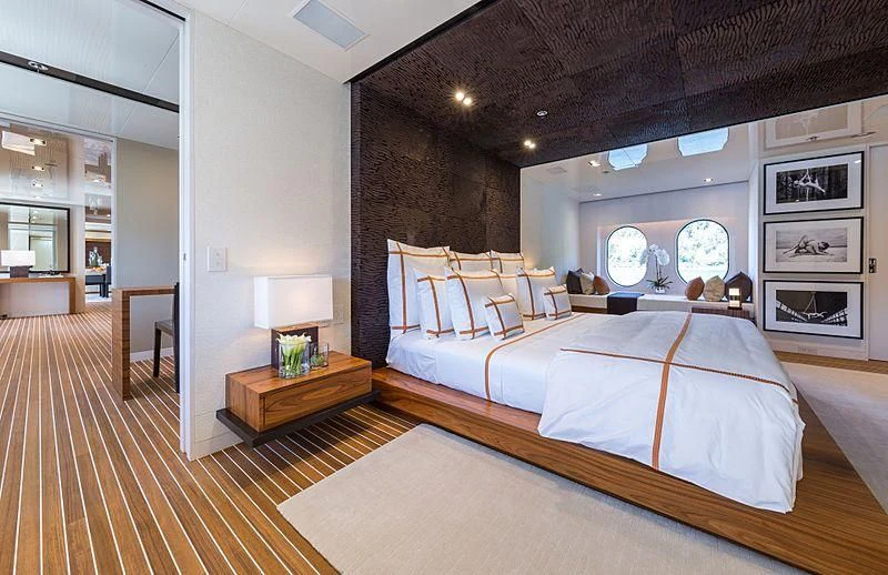 a large bedroom with a large bed aboard CHASSEUR Yacht for Charter