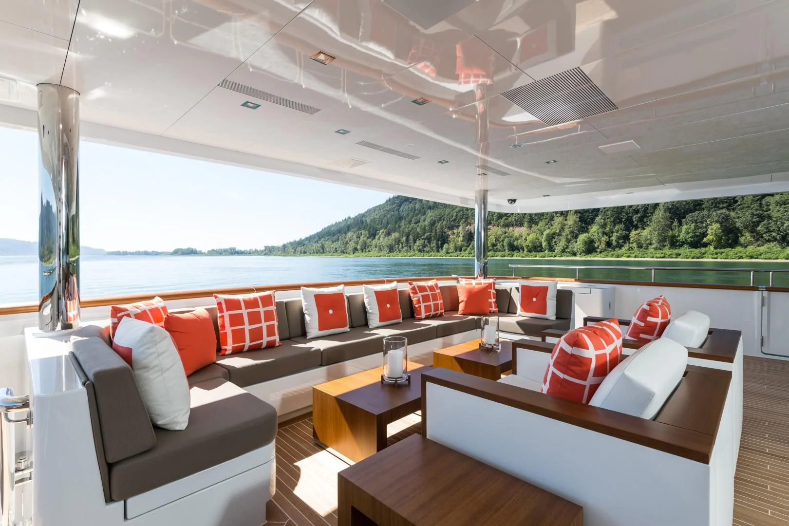 a room with couches and a table and chairs aboard CHASSEUR Yacht for Charter
