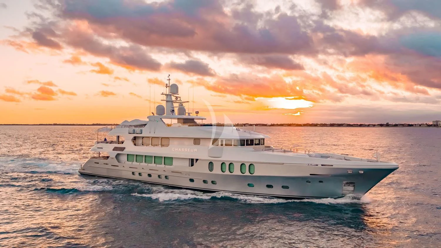 a large white ship in the water aboard CHASSEUR Yacht for Charter