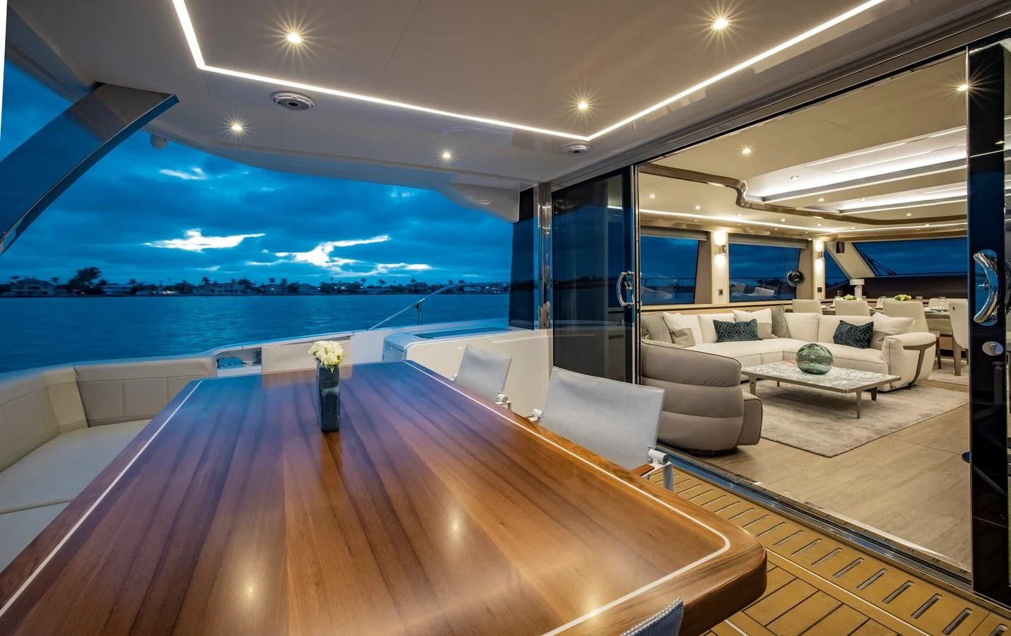 a living room with a large pool aboard PLANE TO SEA Yacht for Sale