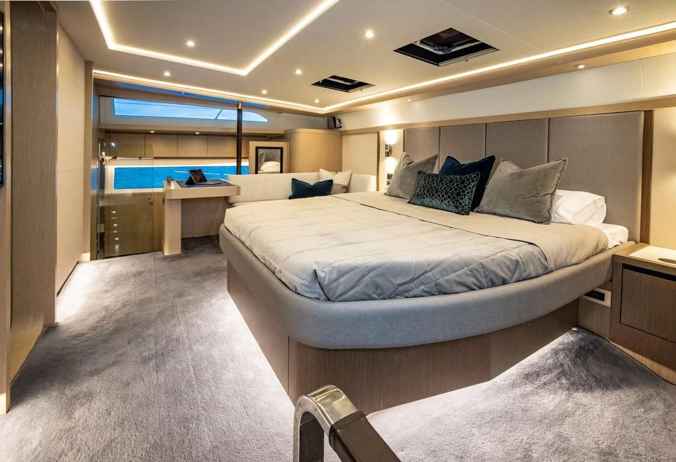 a bed in a room aboard PLANE TO SEA Yacht for Sale