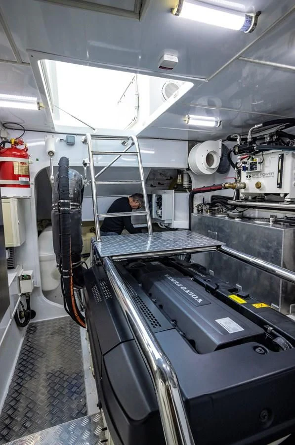 a person working in a factory aboard PLANE TO SEA Yacht for Sale