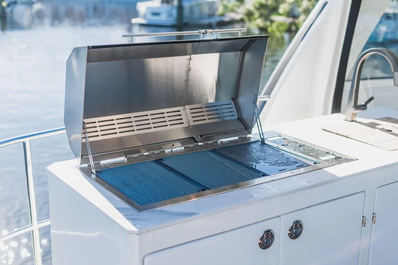a laptop on a white table aboard PLANE TO SEA Yacht for Sale