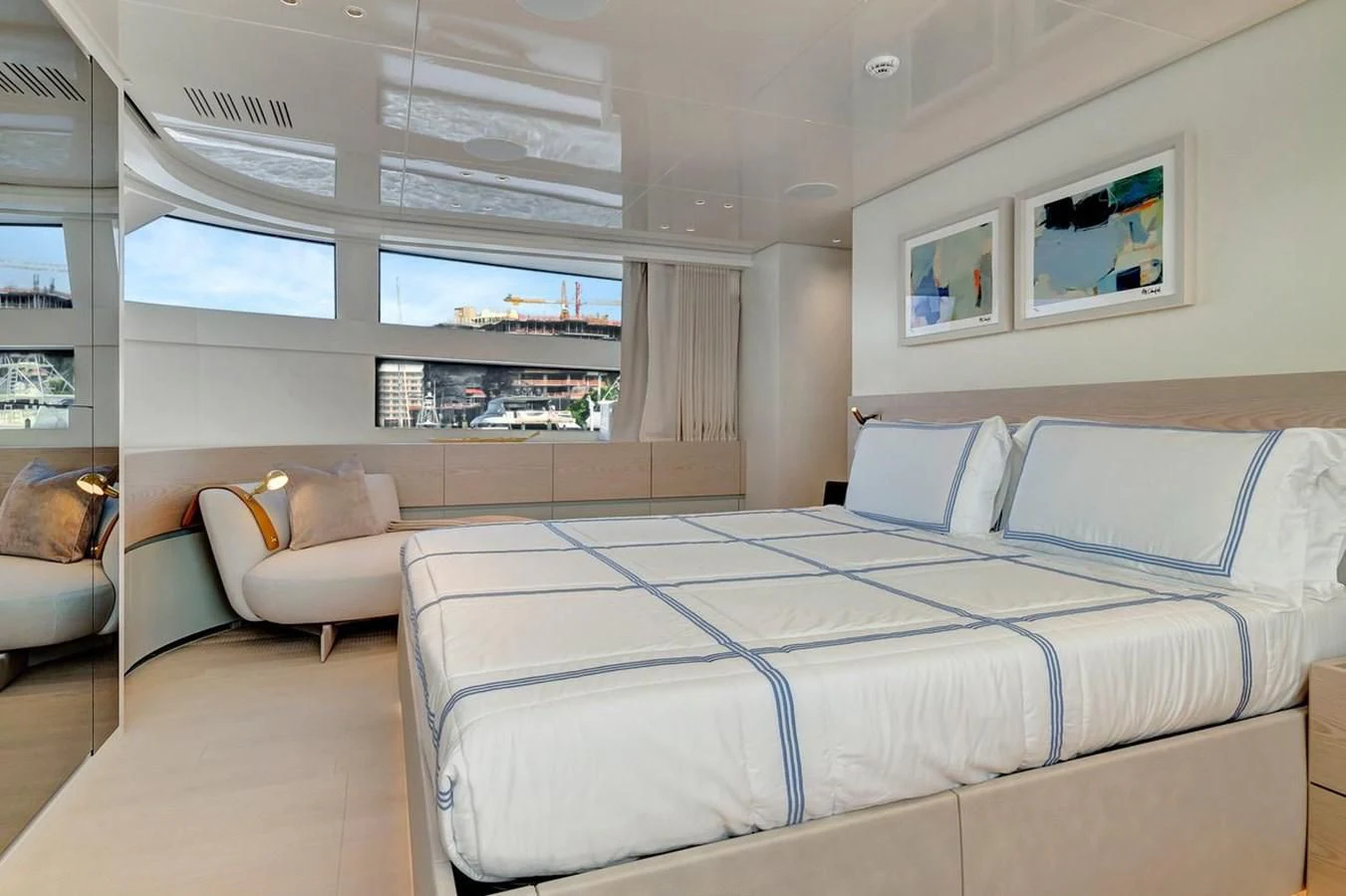 a room with a bed and a couch aboard JICJ Yacht for Sale