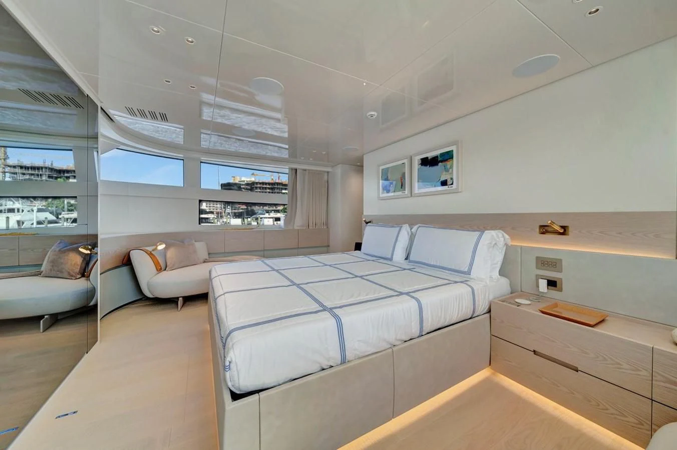 a room with a bed and a desk aboard JICJ Yacht for Sale
