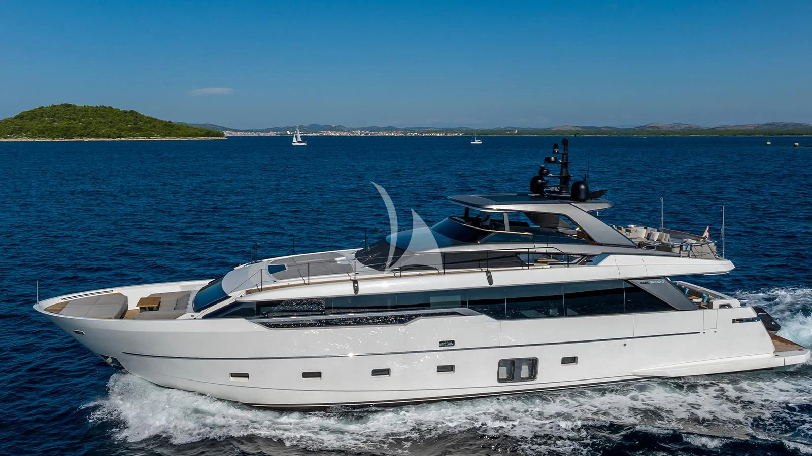 a white yacht on the water aboard JICJ Yacht for Sale