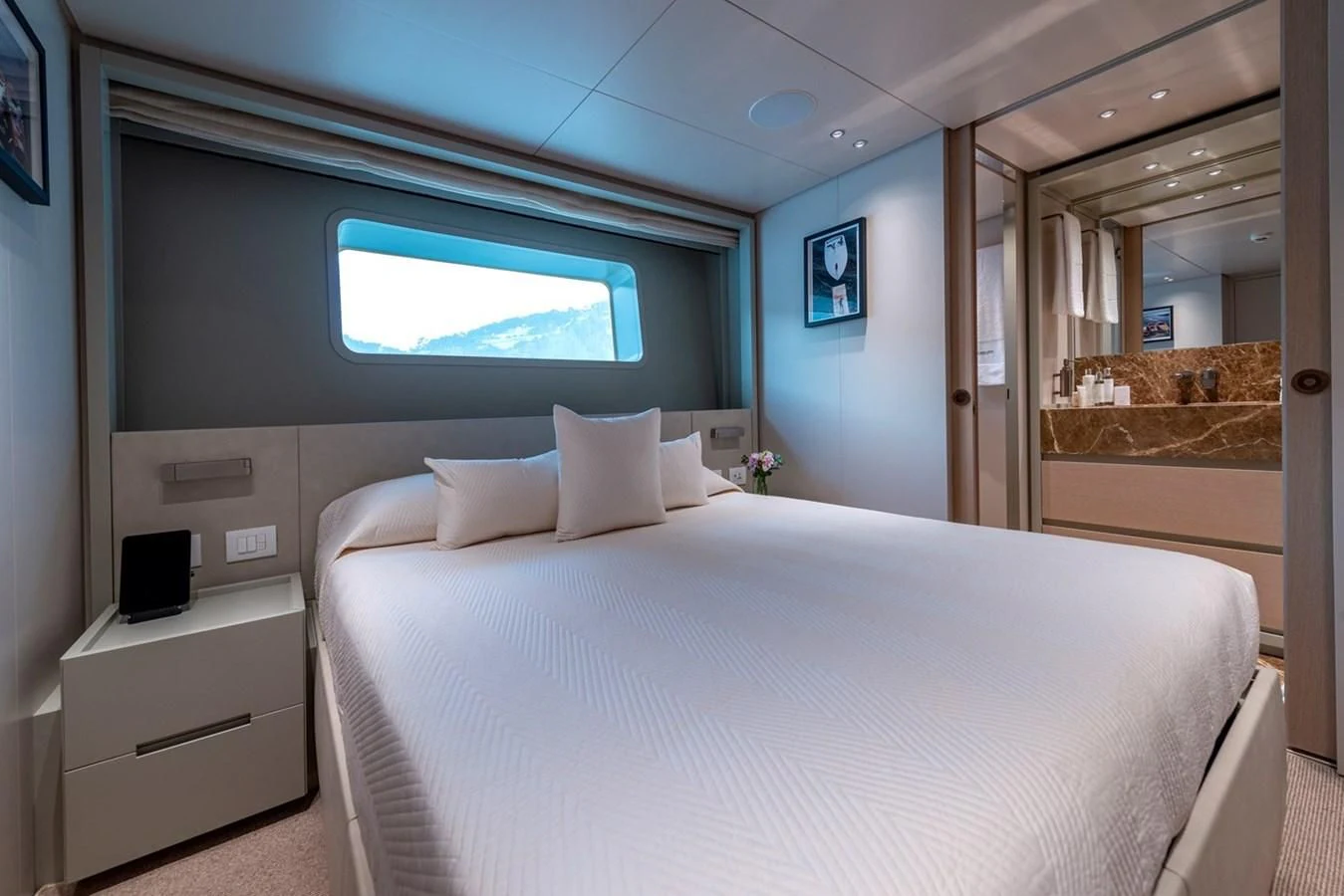 a bed in a room aboard JICJ Yacht for Sale