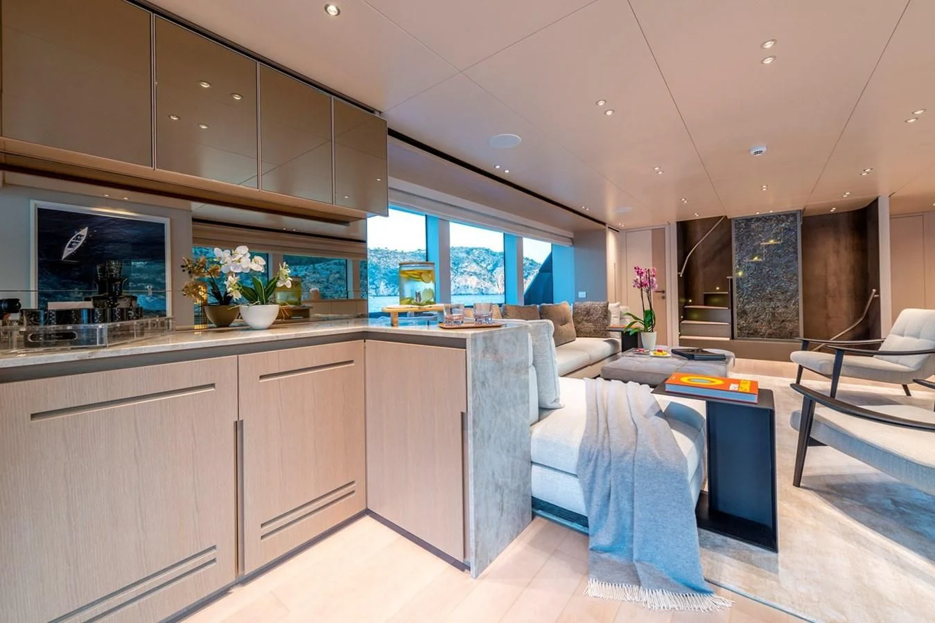 a kitchen with a bed and a couch aboard JICJ Yacht for Sale